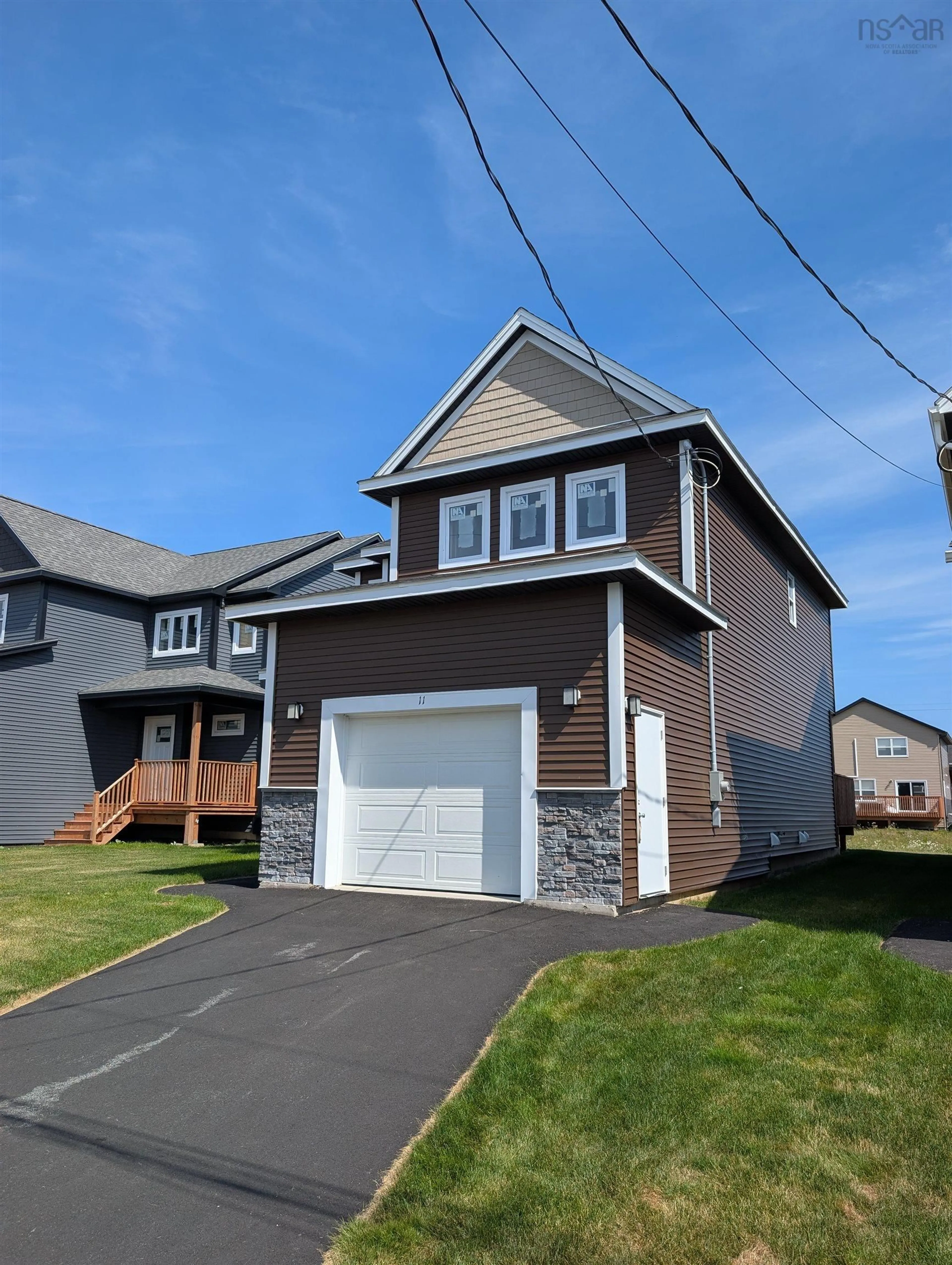 Home with vinyl exterior material, street for 11 Brick Lane, Halifax Nova Scotia B3P 0G4