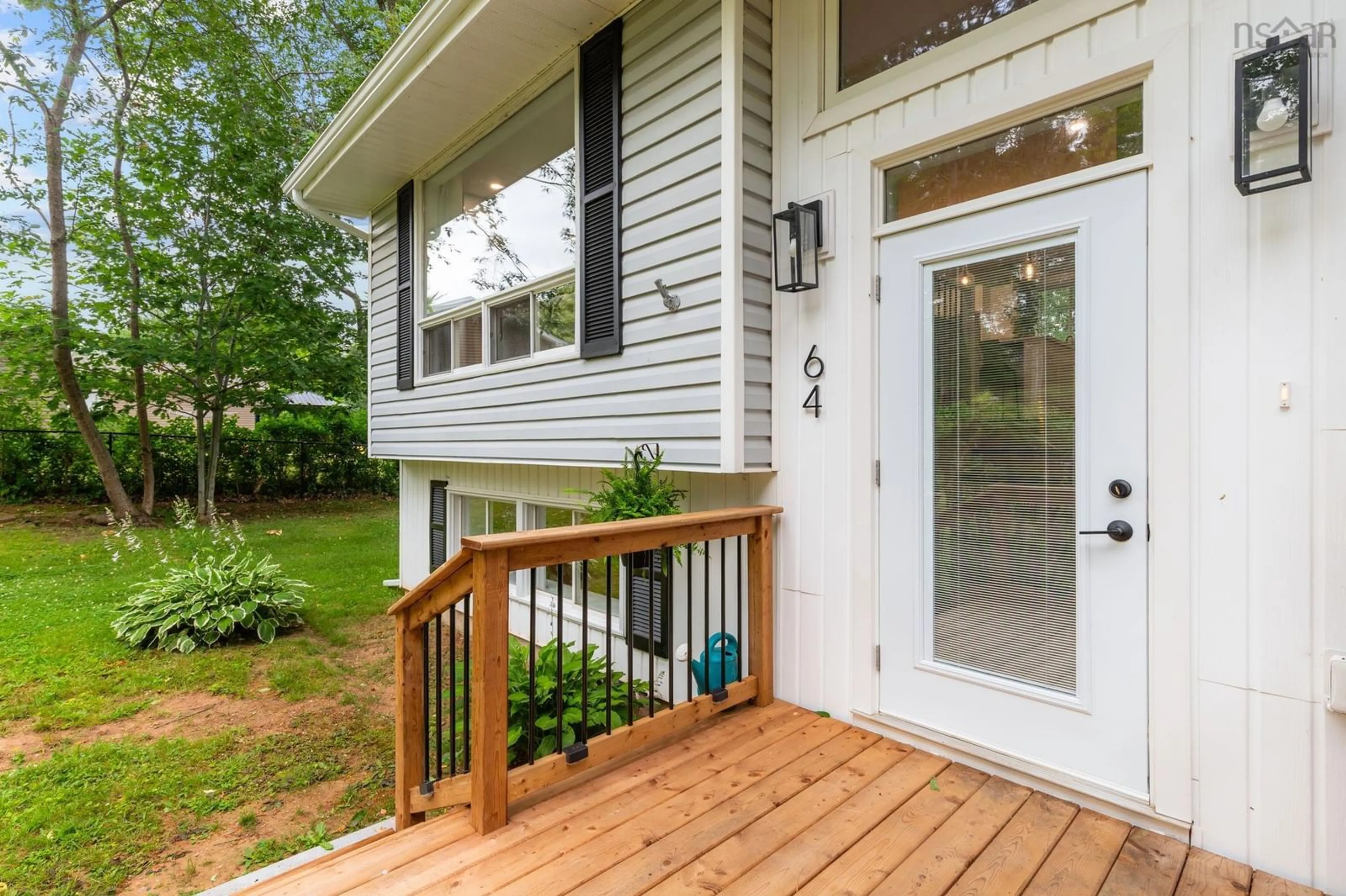 Home with vinyl exterior material, street for 64 Dow Rd, New Minas Nova Scotia B4N 3R5