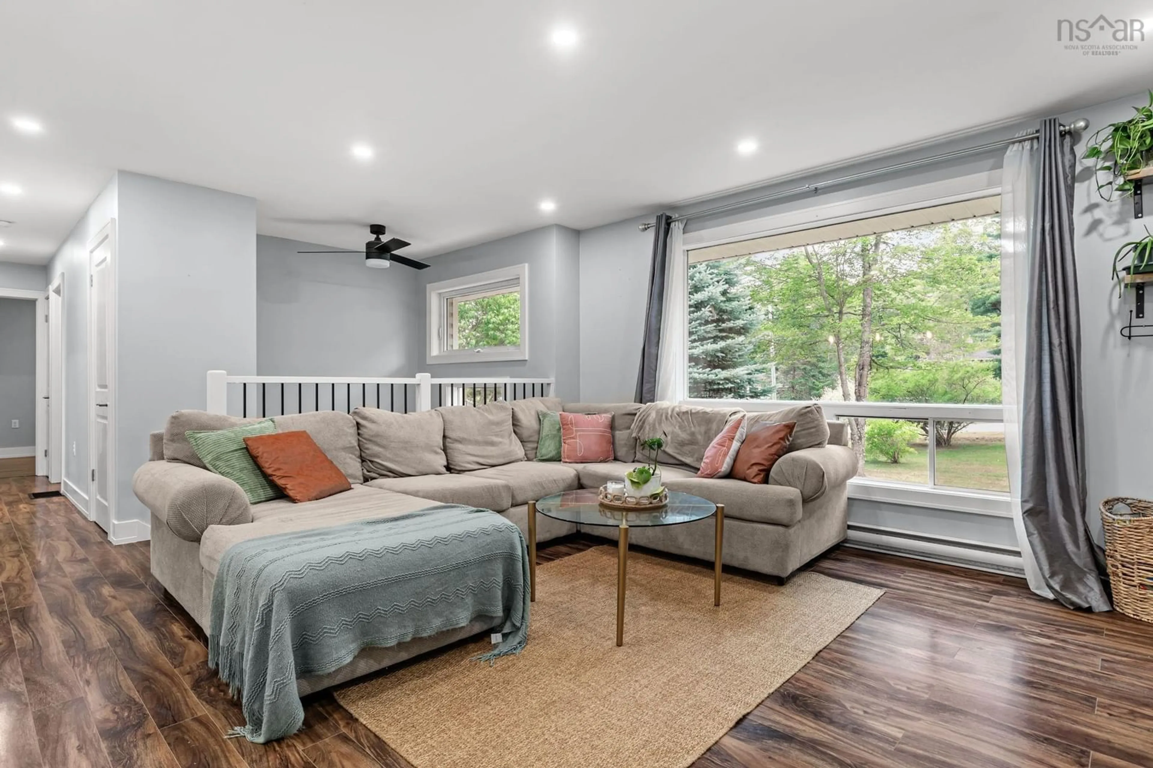 Living room with furniture, wood/laminate floor for 64 Dow Rd, New Minas Nova Scotia B4N 3R5