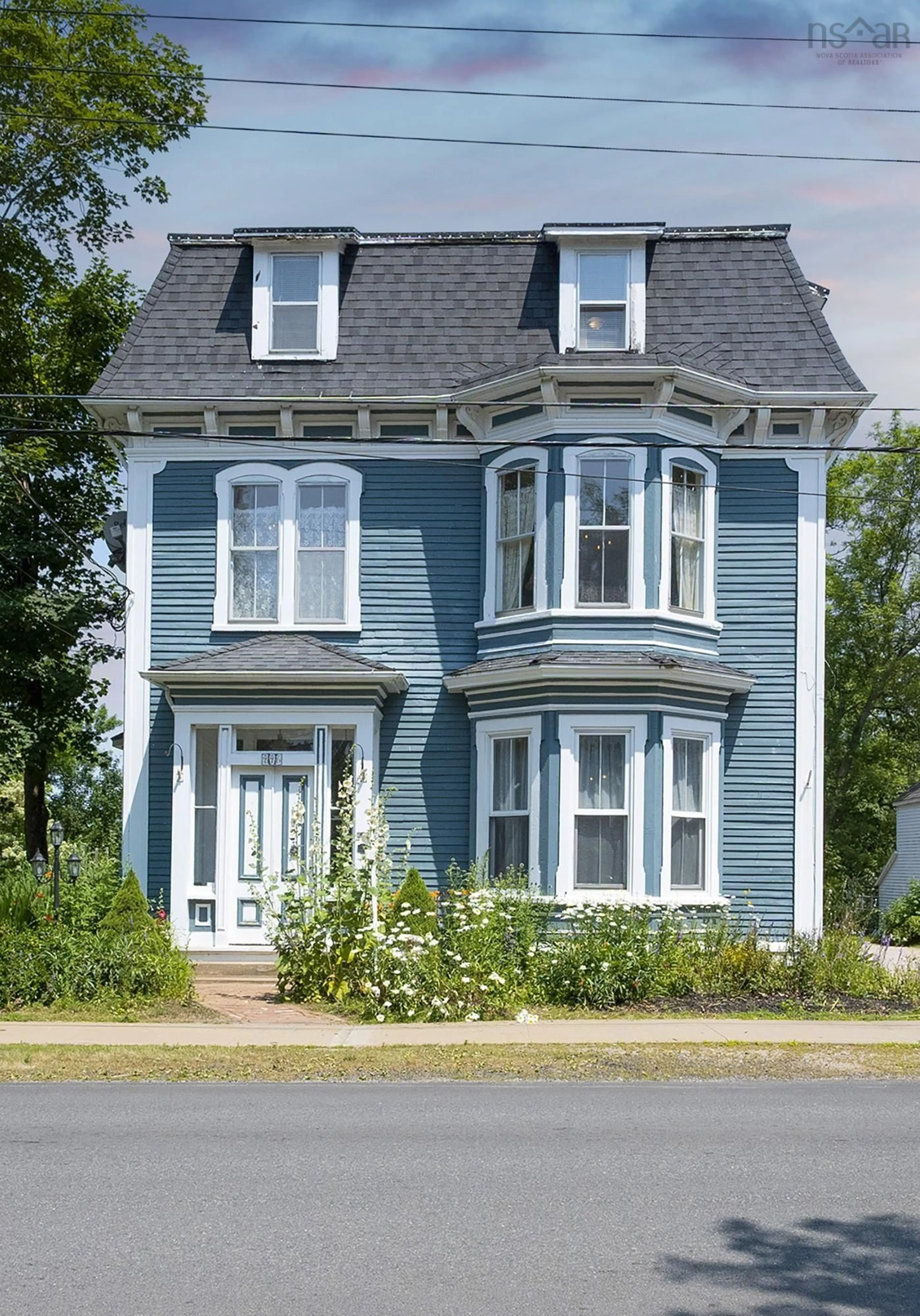 Home with vinyl exterior material, street for 446 St George Street St, Annapolis Royal Nova Scotia B0S 1A0
