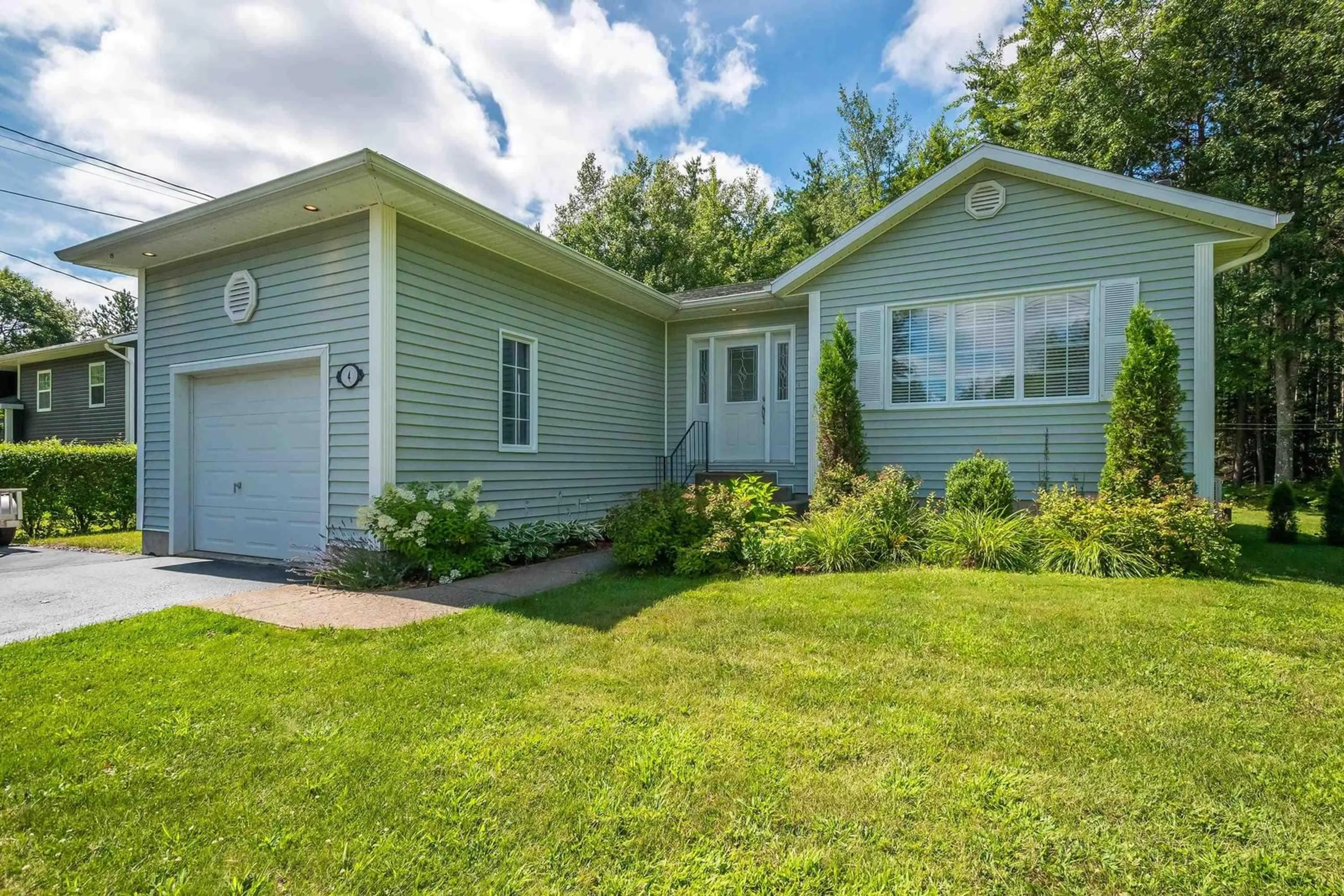 Home with vinyl exterior material, street for 4 Robie Ave, Greenwood Nova Scotia B0P 1R0