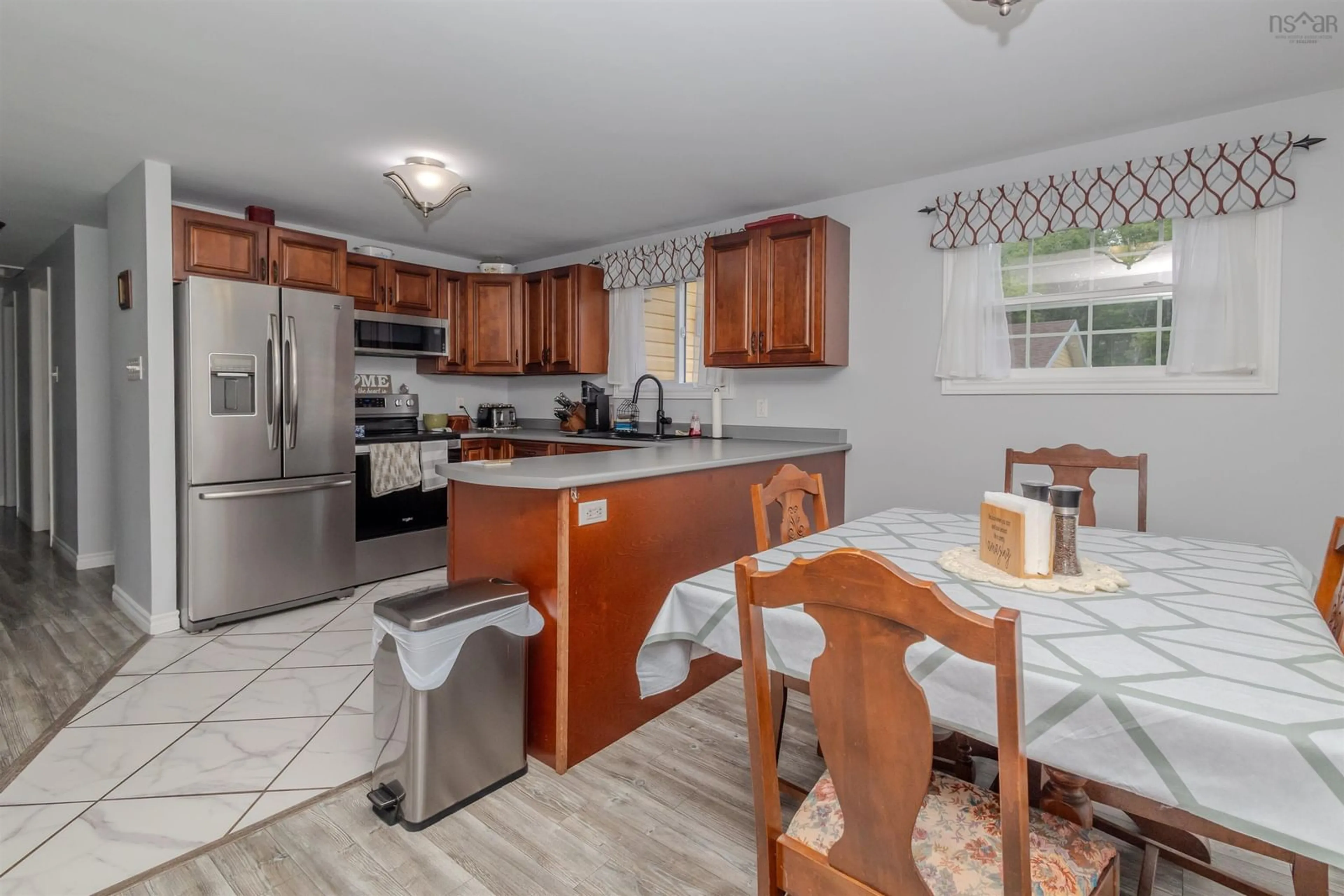Open concept kitchen, ceramic/tile floor for 27 Erinmore Dr, Sydney Nova Scotia B1M 1A7