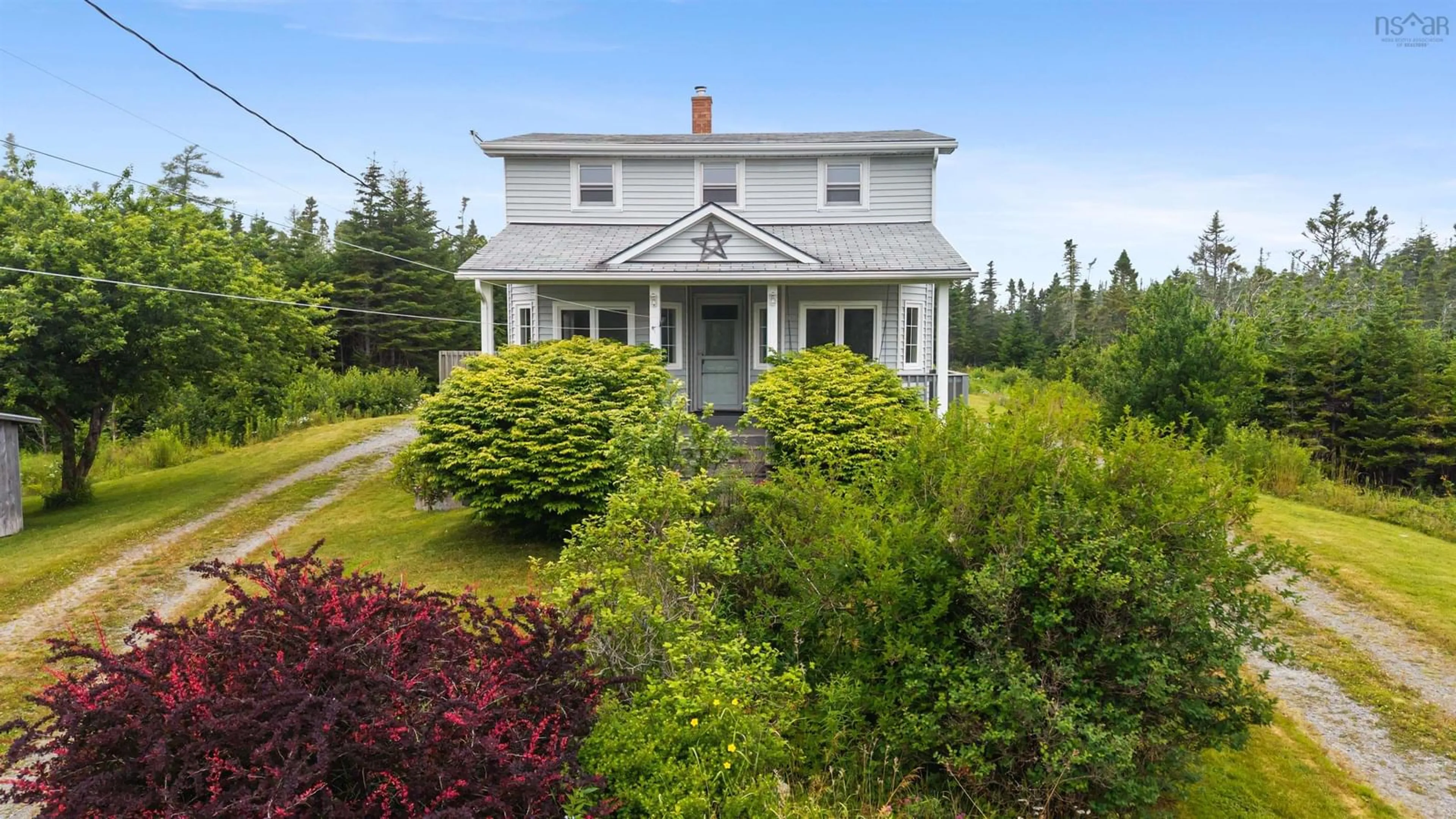 A pic from outside/outdoor area/front of a property/back of a property/a pic from drone, unknown for 5069 Highway 211, Port Bickerton Nova Scotia B0J 1A0