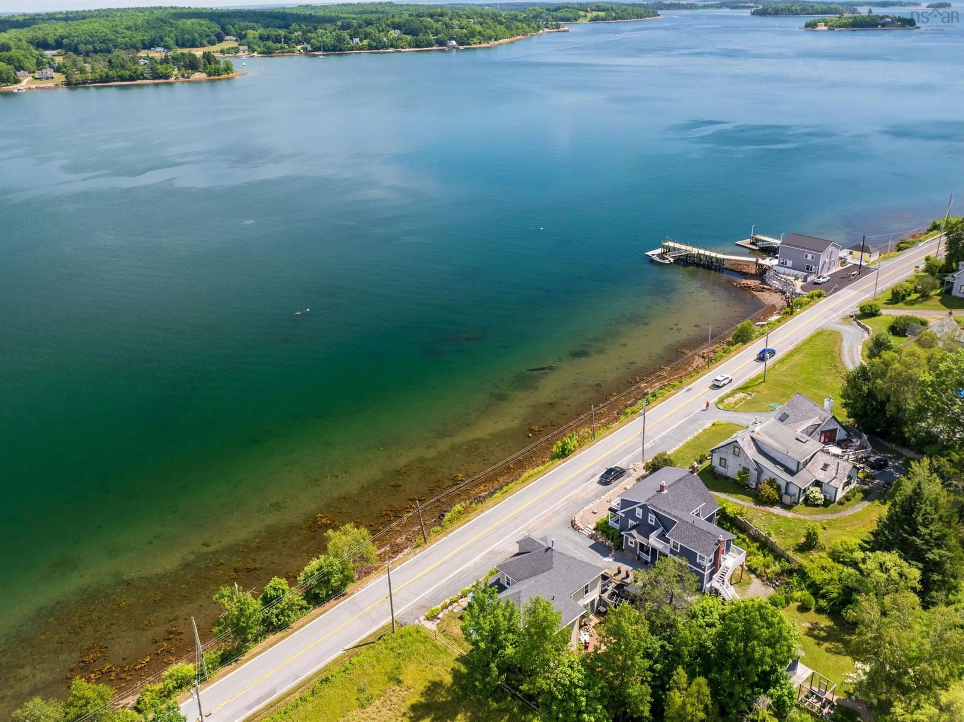 A pic from outside/outdoor area/front of a property/back of a property/a pic from drone, water/lake/river/ocean view for 958 Main St, Mahone Bay Nova Scotia B0J 2E0
