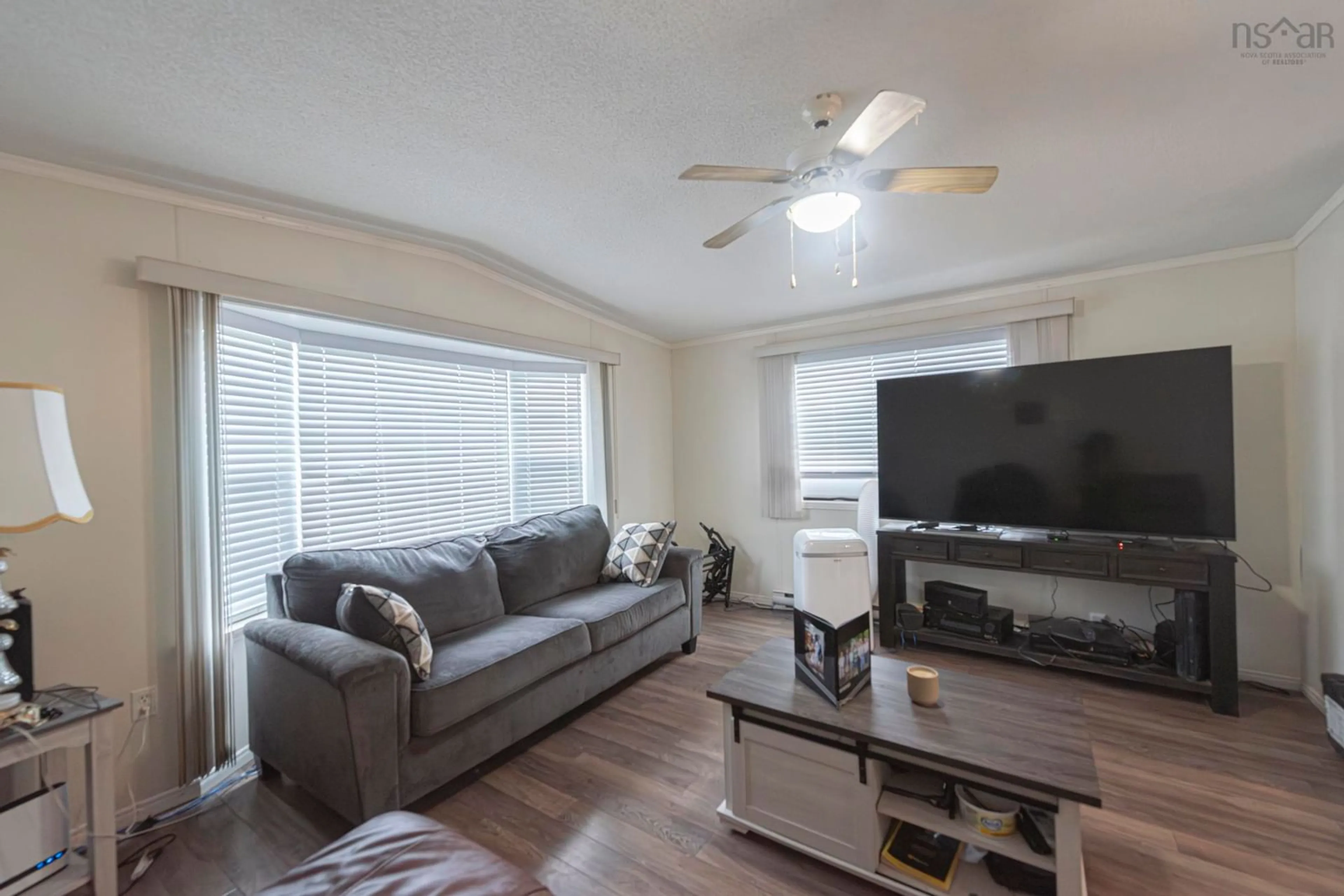 Living room with furniture, unknown for 10 High Street Estates, New Glasgow Nova Scotia B2H 4B8