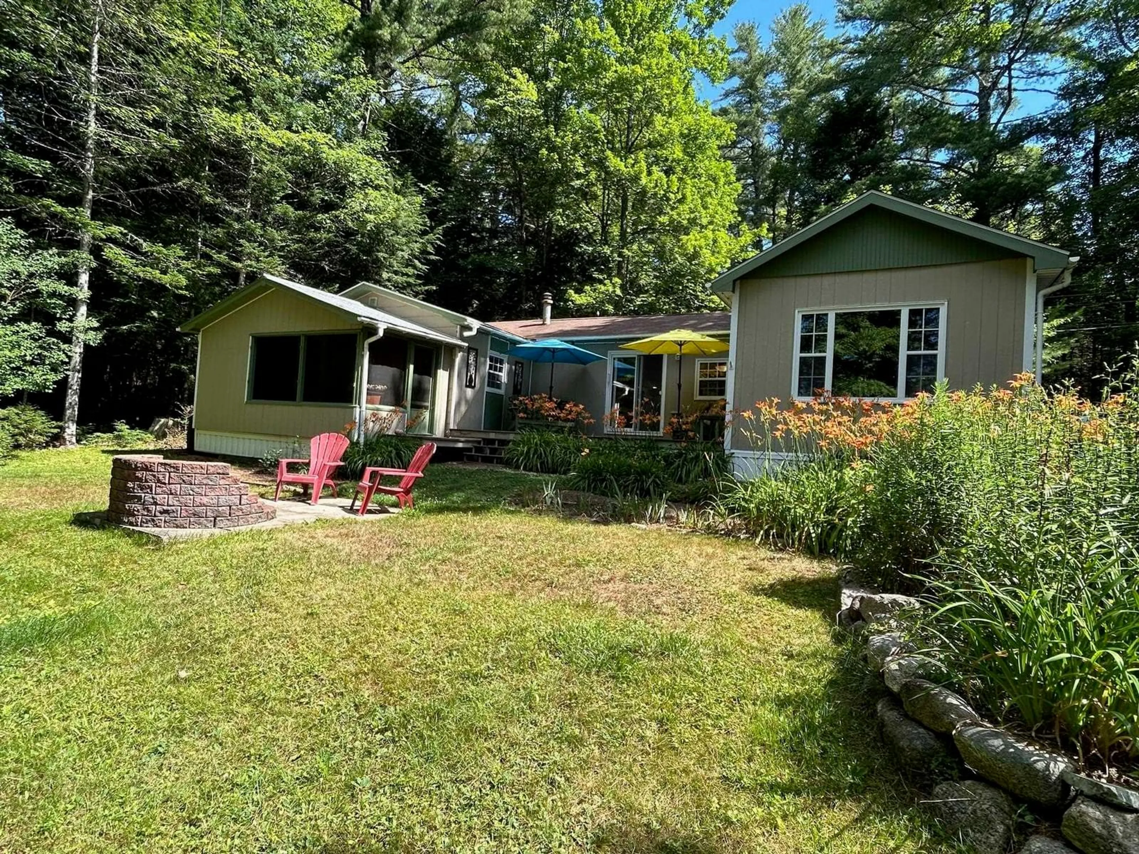 A pic from outside/outdoor area/front of a property/back of a property/a pic from drone, water/lake/river/ocean view for 283 Brandy Lane, North River Nova Scotia B0R 1E0