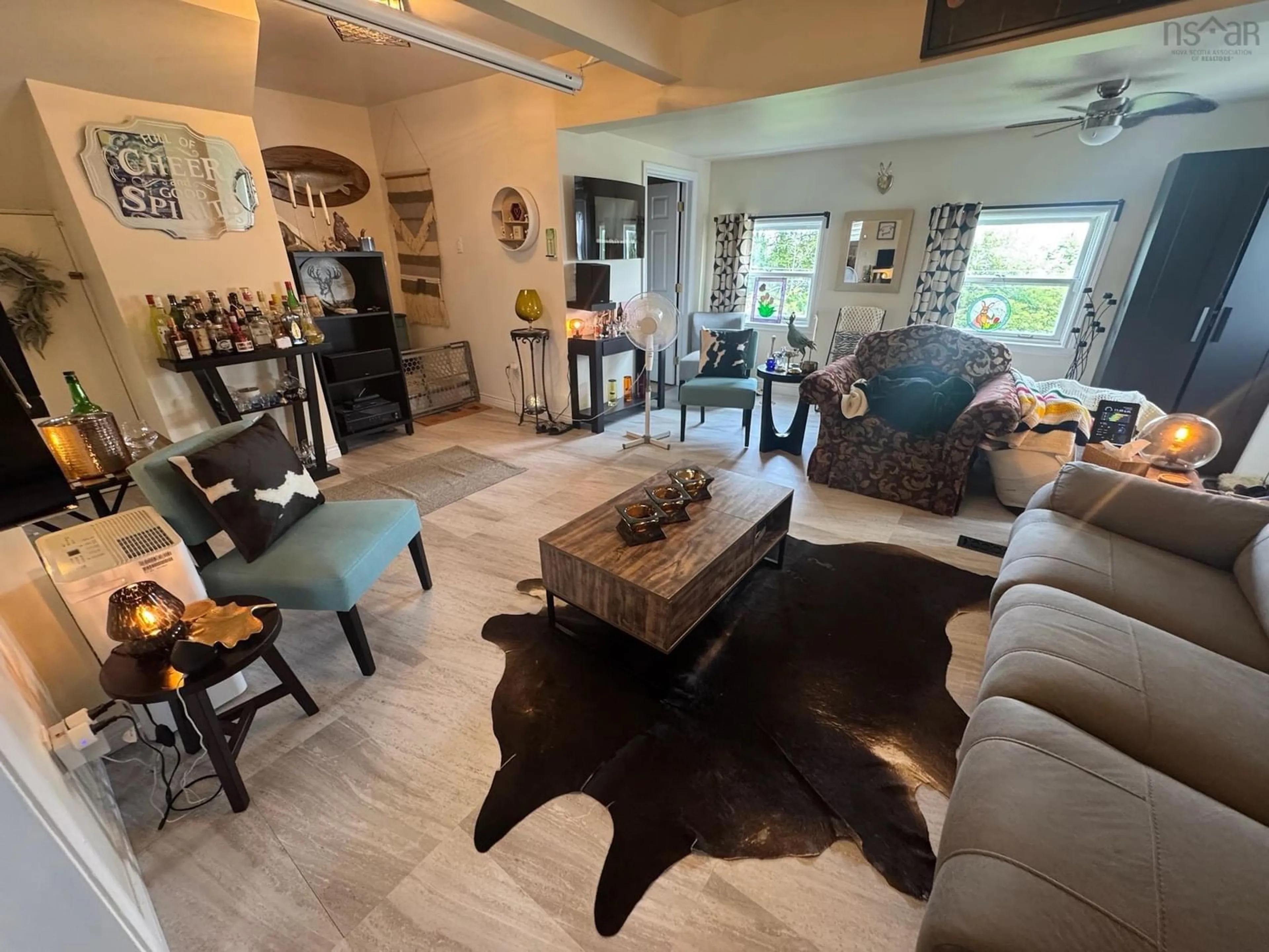 Living room with furniture, unknown for 9 Somers View, Mulgrave Nova Scotia B0E 2G0