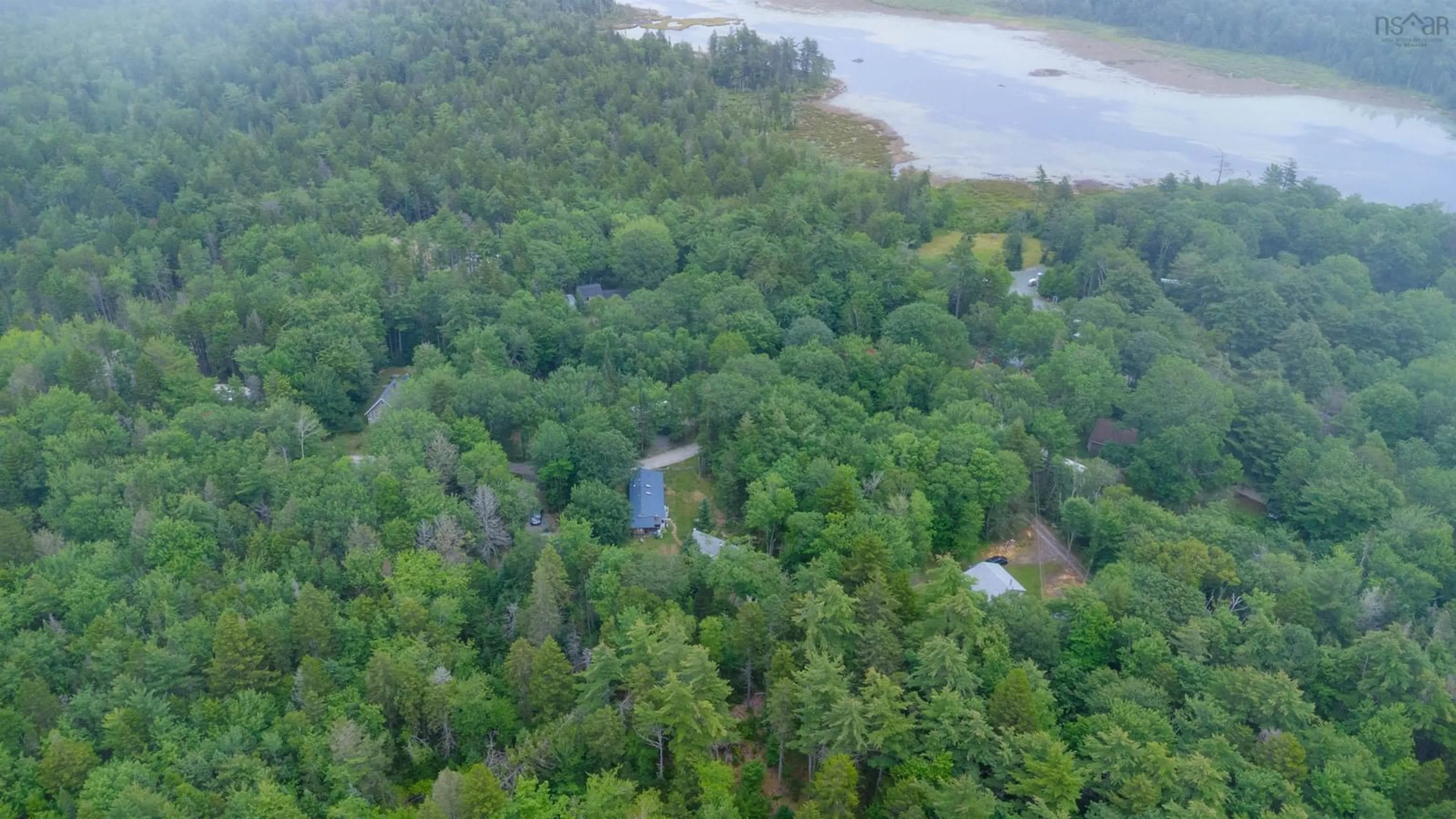 A pic from outside/outdoor area/front of a property/back of a property/a pic from drone, water/lake/river/ocean view for 1387 Canada Hill Rd, Lockeport Nova Scotia B0T 1L0