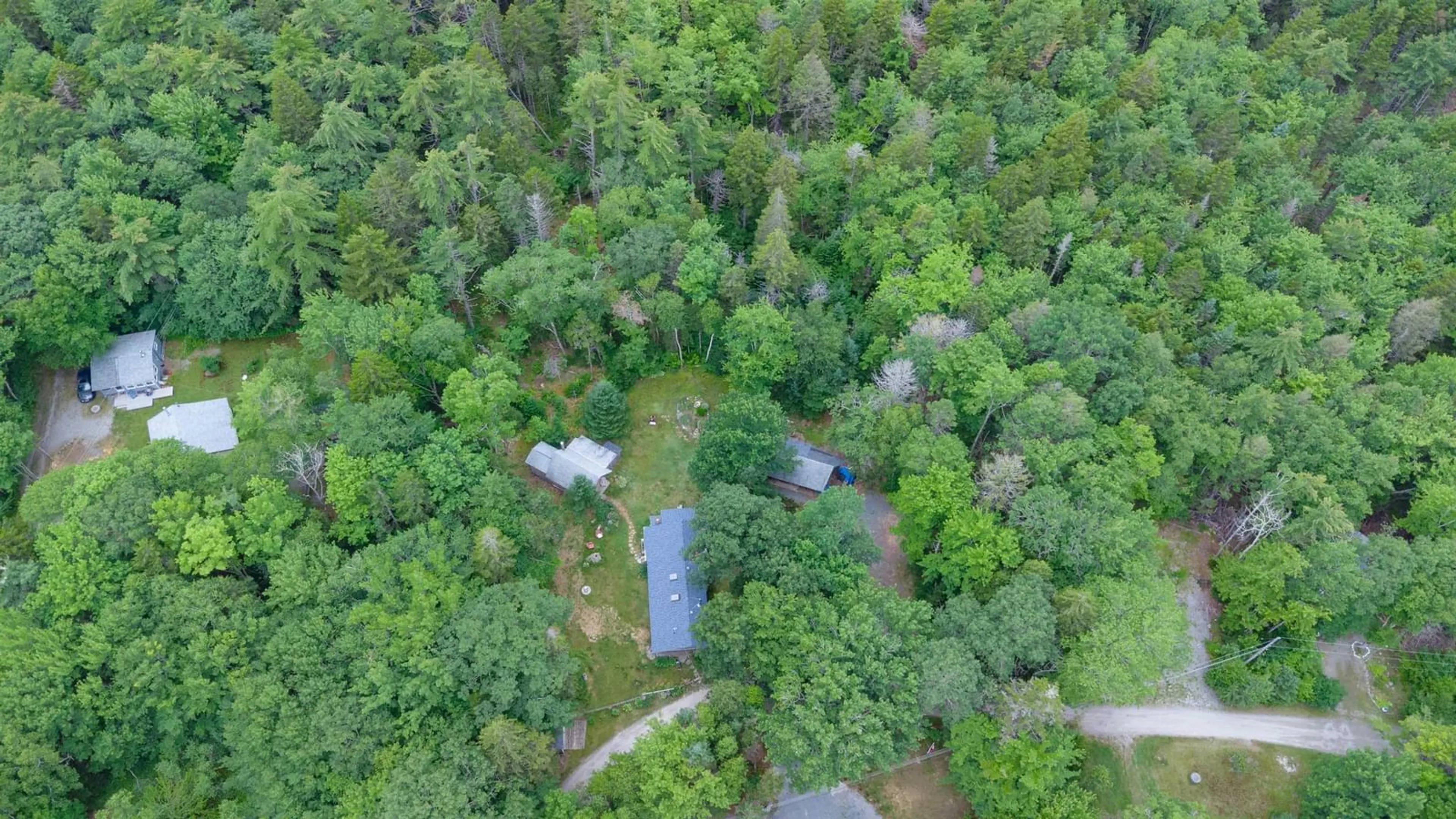 A pic from outside/outdoor area/front of a property/back of a property/a pic from drone, forest/trees view for 1387 Canada Hill Rd, Lockeport Nova Scotia B0T 1L0