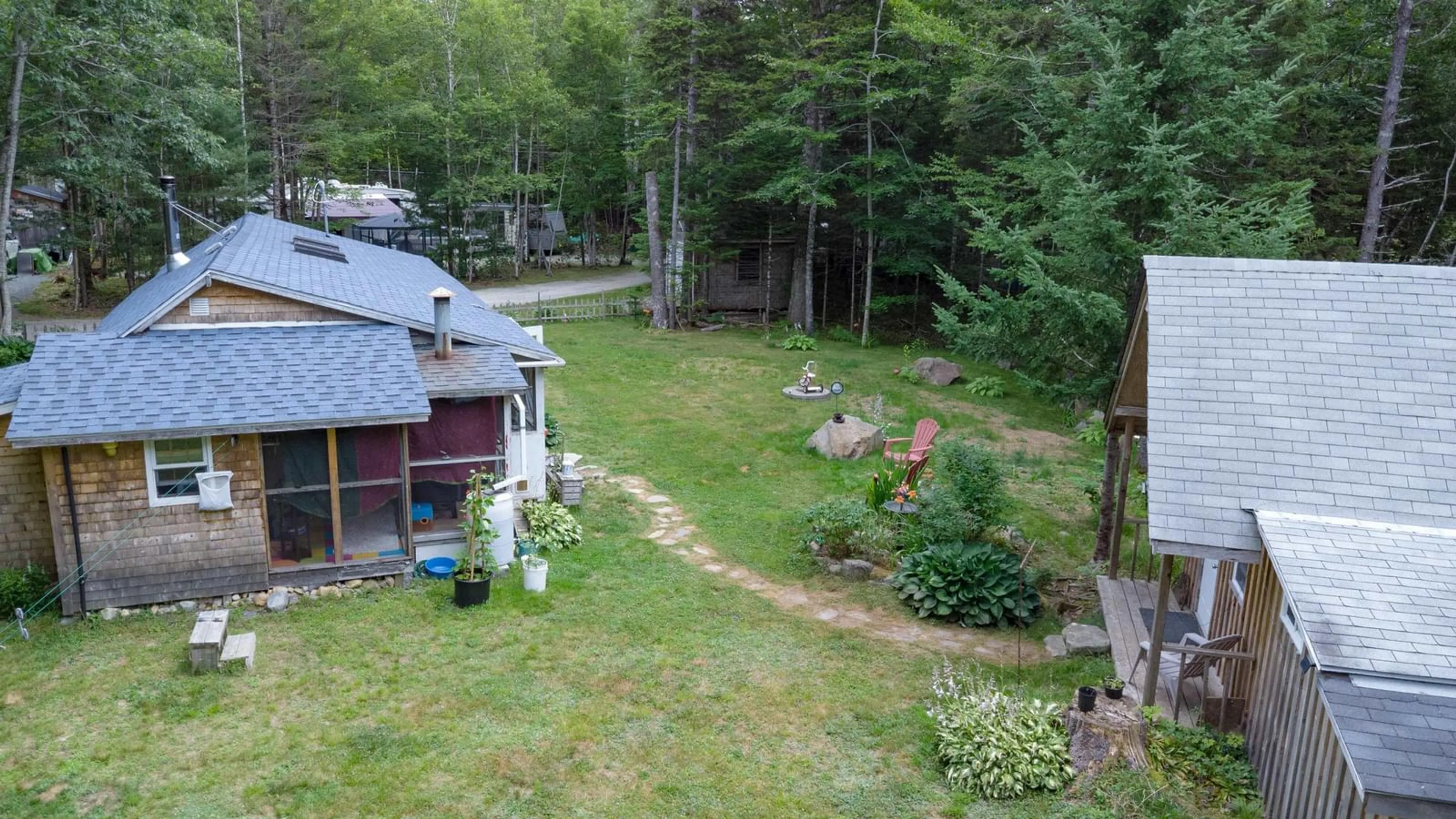 A pic from outside/outdoor area/front of a property/back of a property/a pic from drone, forest/trees view for 1387 Canada Hill Rd, Lockeport Nova Scotia B0T 1L0