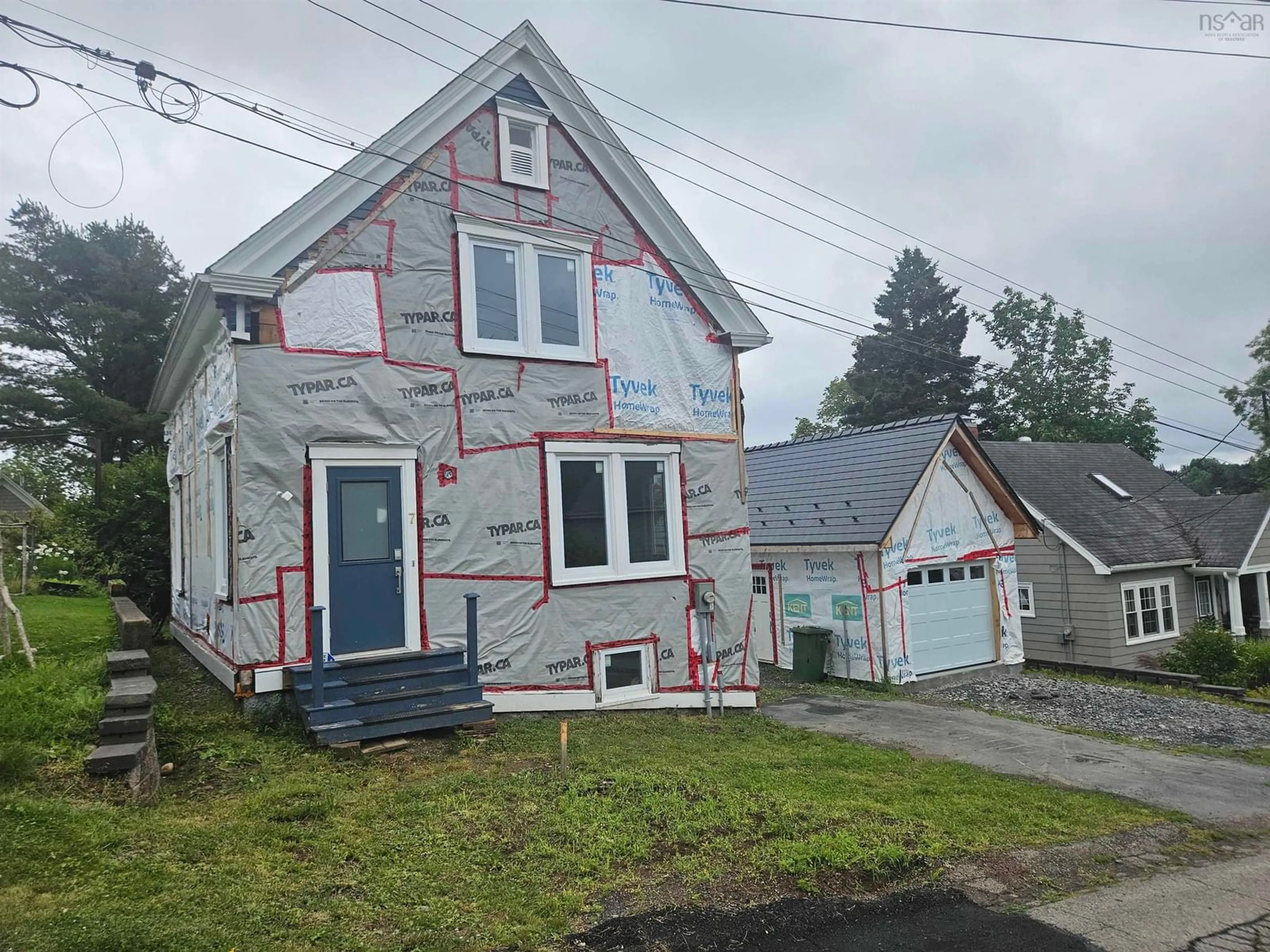 Home with vinyl exterior material, street for 7 Mckenzie St, Lunenburg Nova Scotia B0J 2C0
