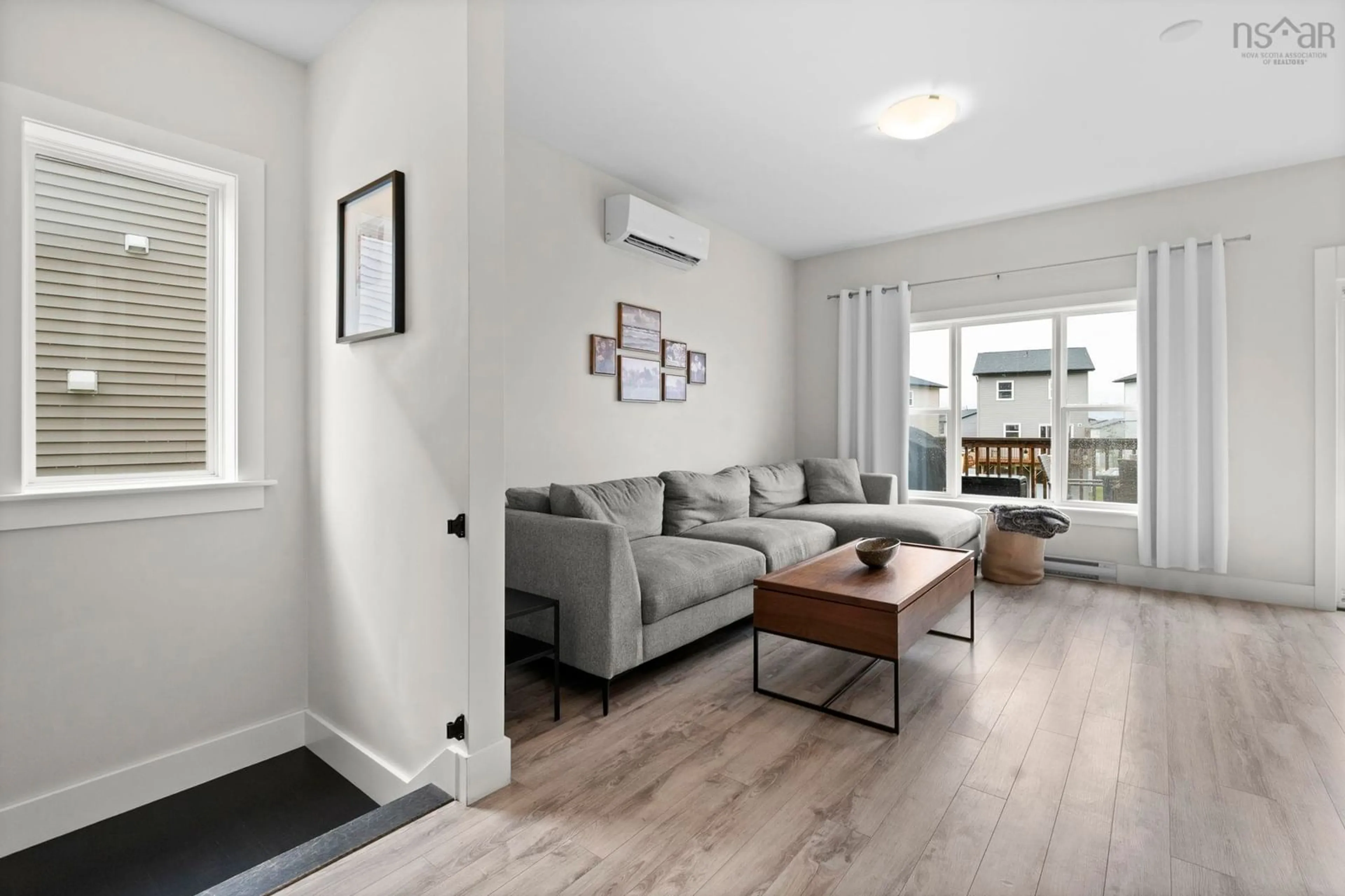 Living room with furniture, wood/laminate floor for 33 Mica Cres, Halifax Nova Scotia B3P 0G7