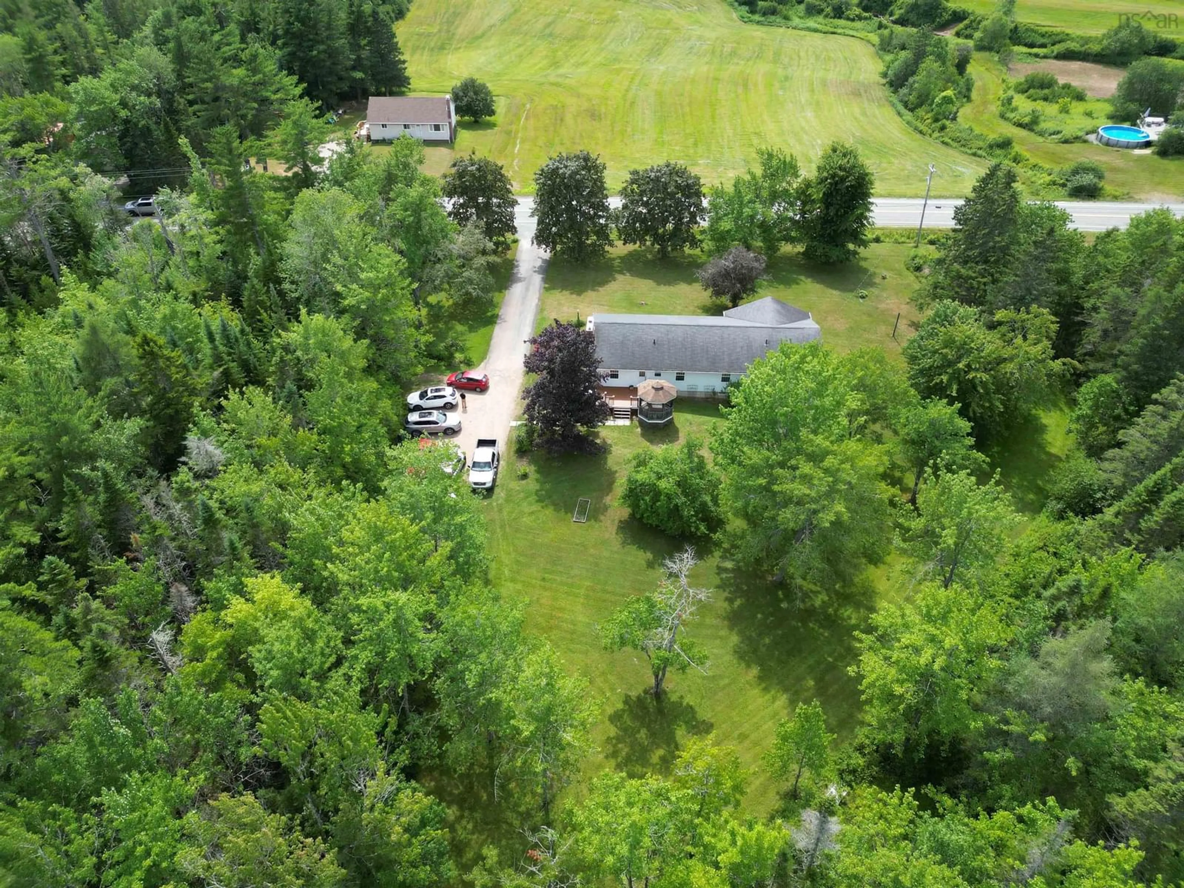 A pic from outside/outdoor area/front of a property/back of a property/a pic from drone, forest/trees view for 7017 Highway 14, Nine Mile River Nova Scotia B2S 2V5