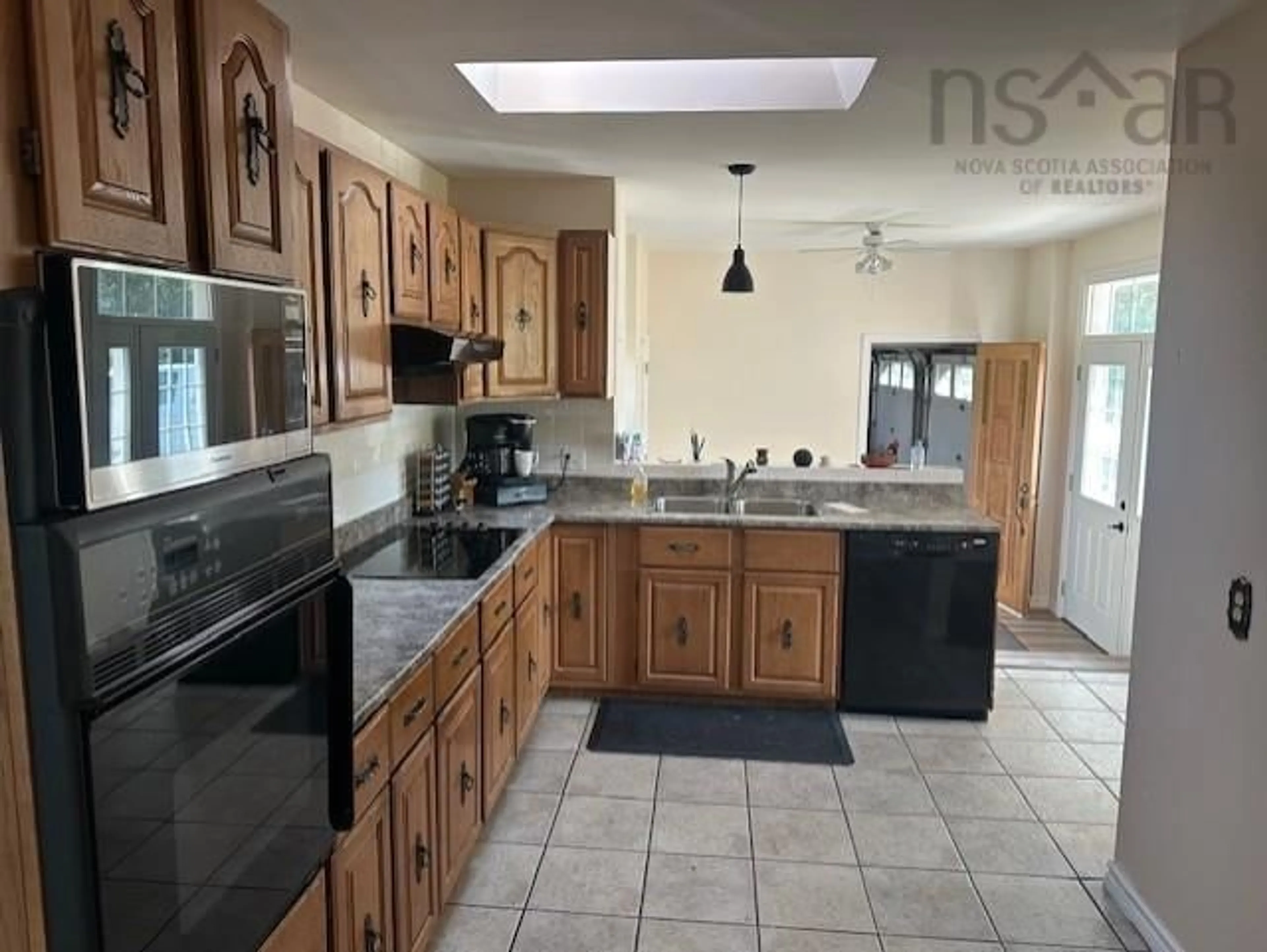 Open concept kitchen, ceramic/tile floor for 5844 Stellarton Trafalgar Rd, Riverton Nova Scotia B0K 1S0
