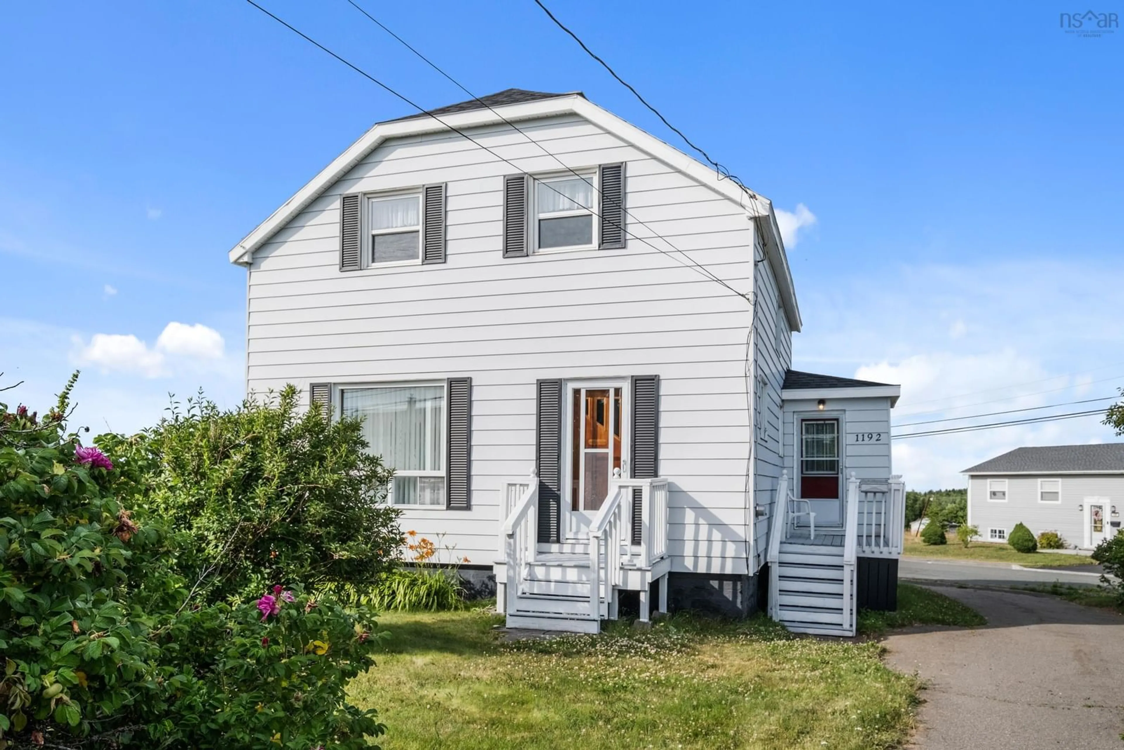 Home with vinyl exterior material, street for 1192 Main St, Glace Bay Nova Scotia B1A 5A2