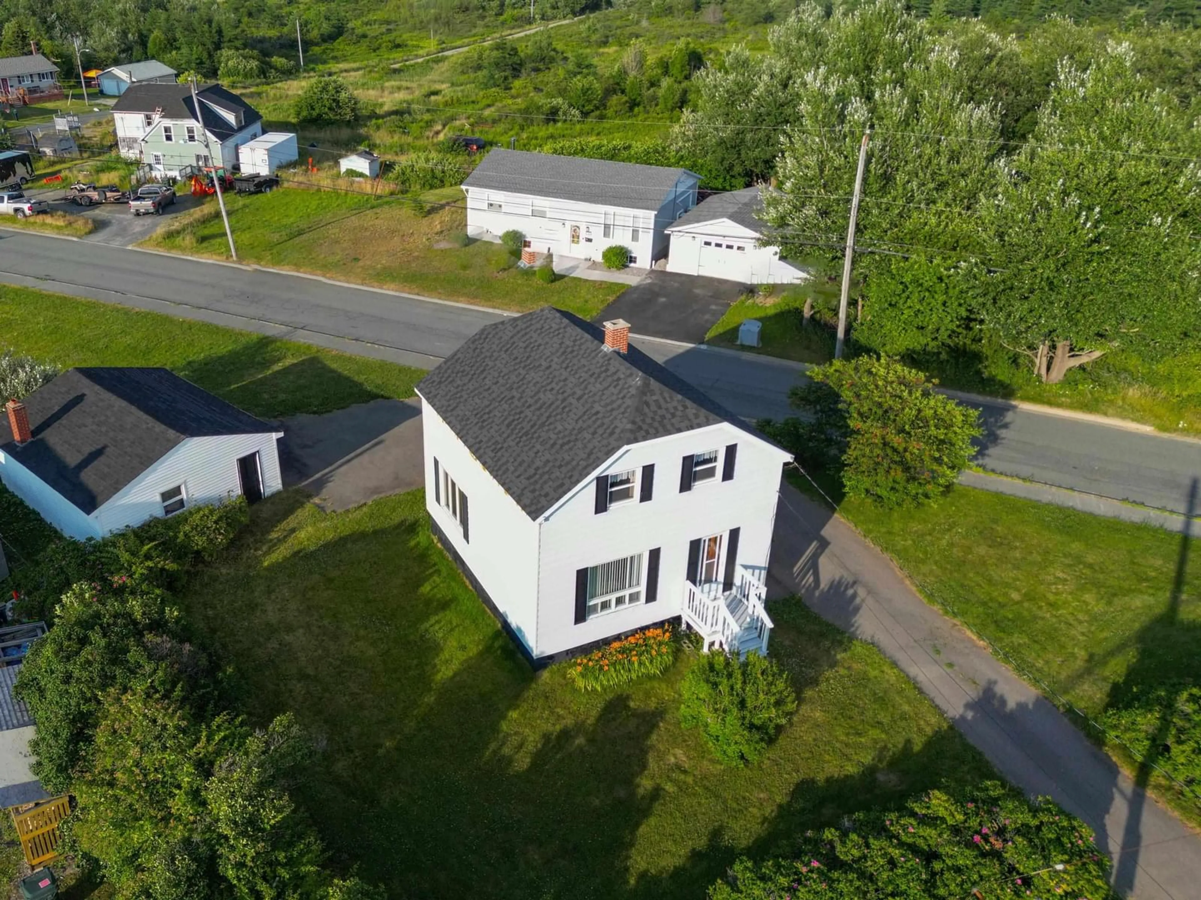 A pic from outside/outdoor area/front of a property/back of a property/a pic from drone, street for 1192 Main St, Glace Bay Nova Scotia B1A 5A2