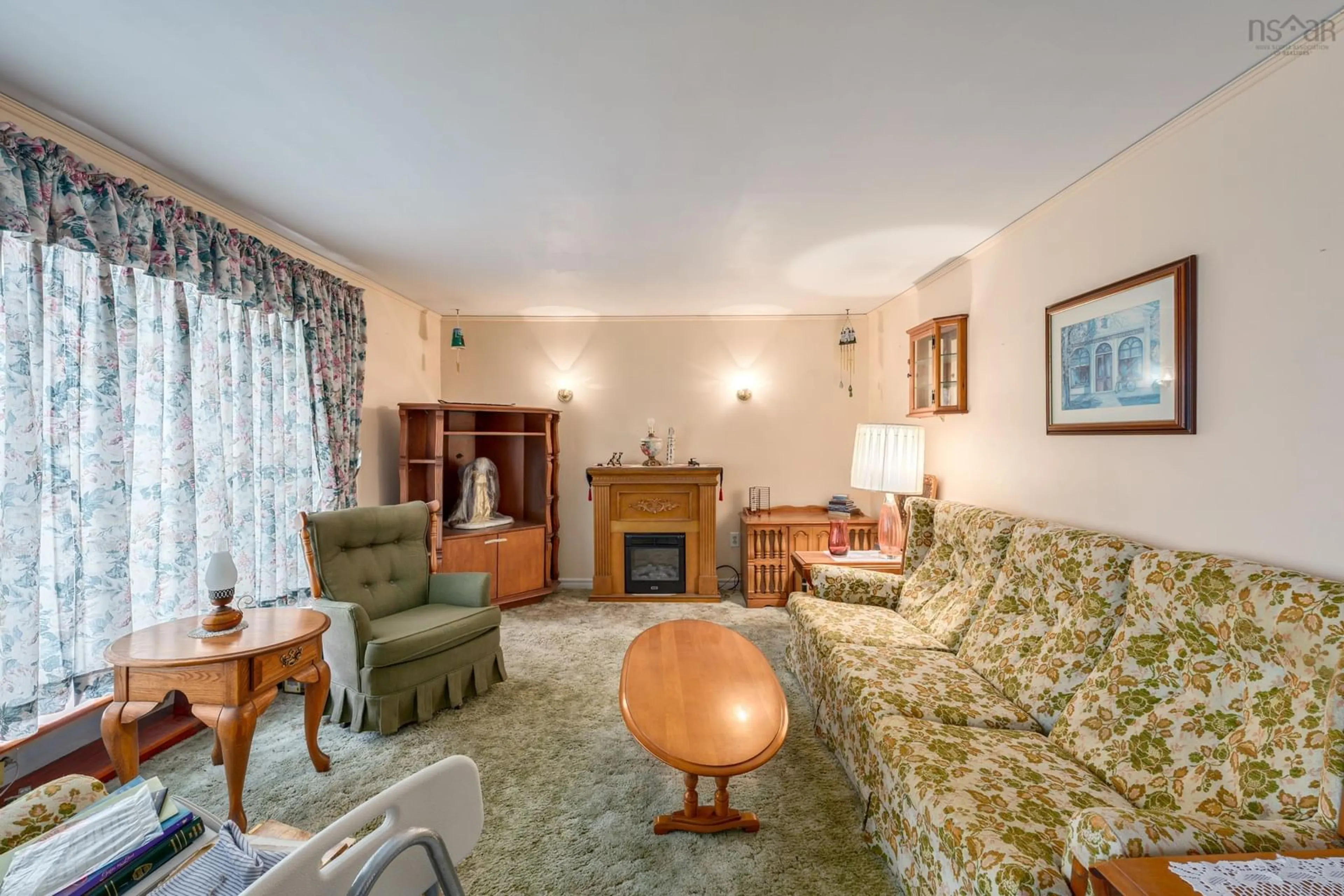 Living room with furniture, carpet floor for 18 Shaw Ave, Yarmouth Nova Scotia B5A 2T9