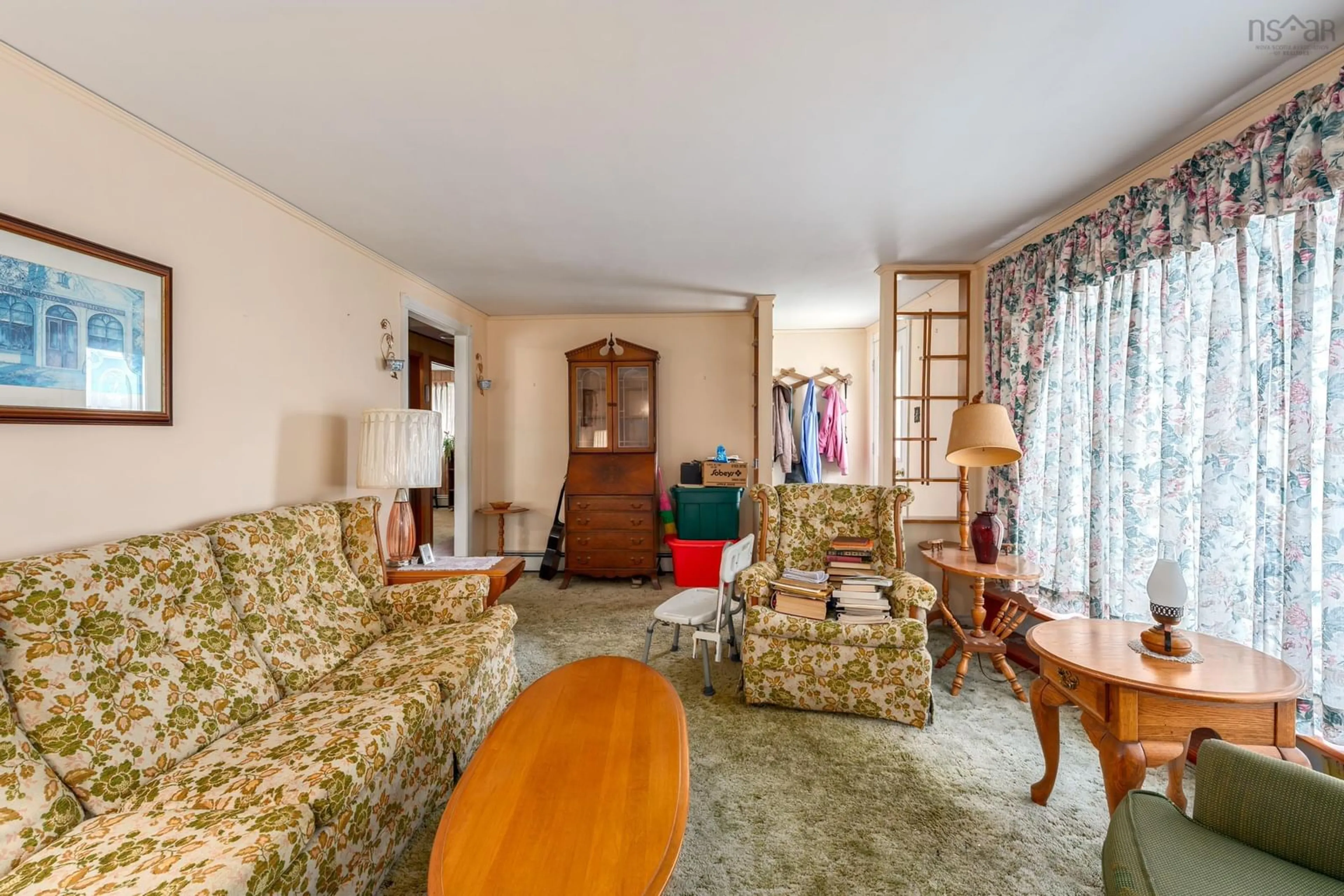 Living room with furniture, carpet floor for 18 Shaw Ave, Yarmouth Nova Scotia B5A 2T9