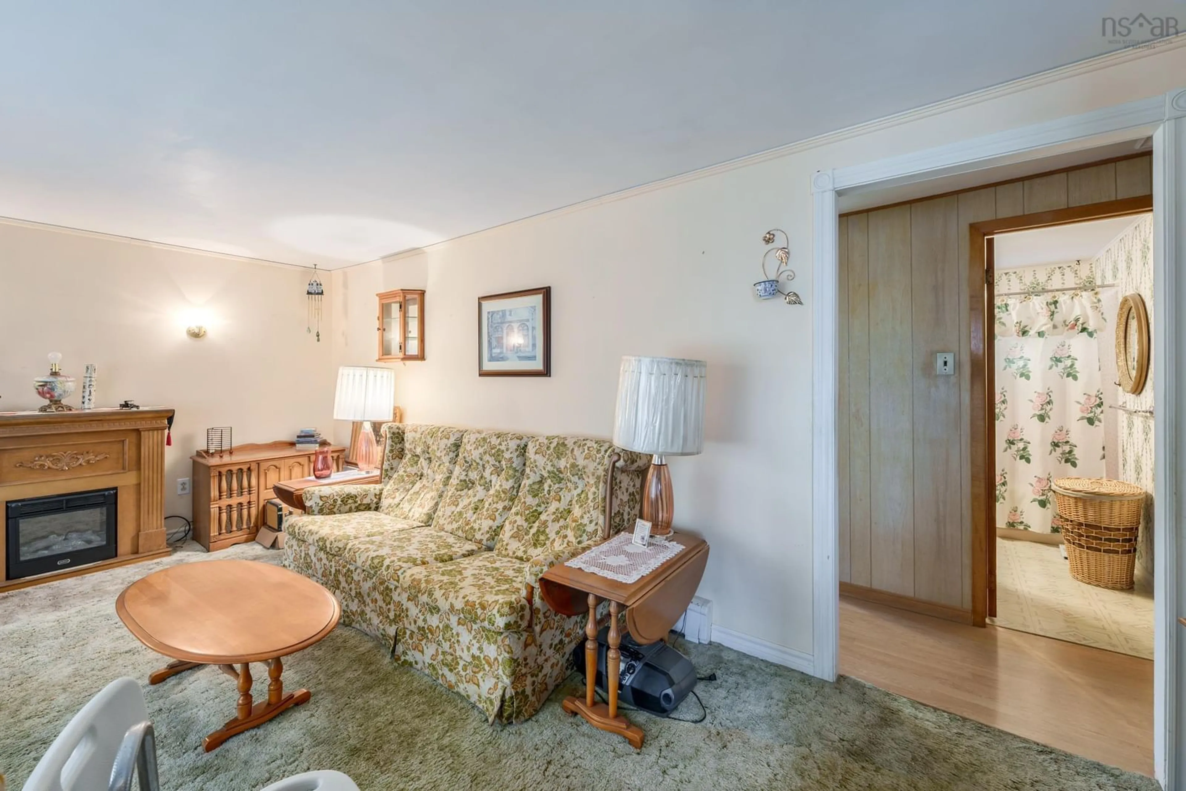 Living room with furniture, unknown for 18 Shaw Ave, Yarmouth Nova Scotia B5A 2T9