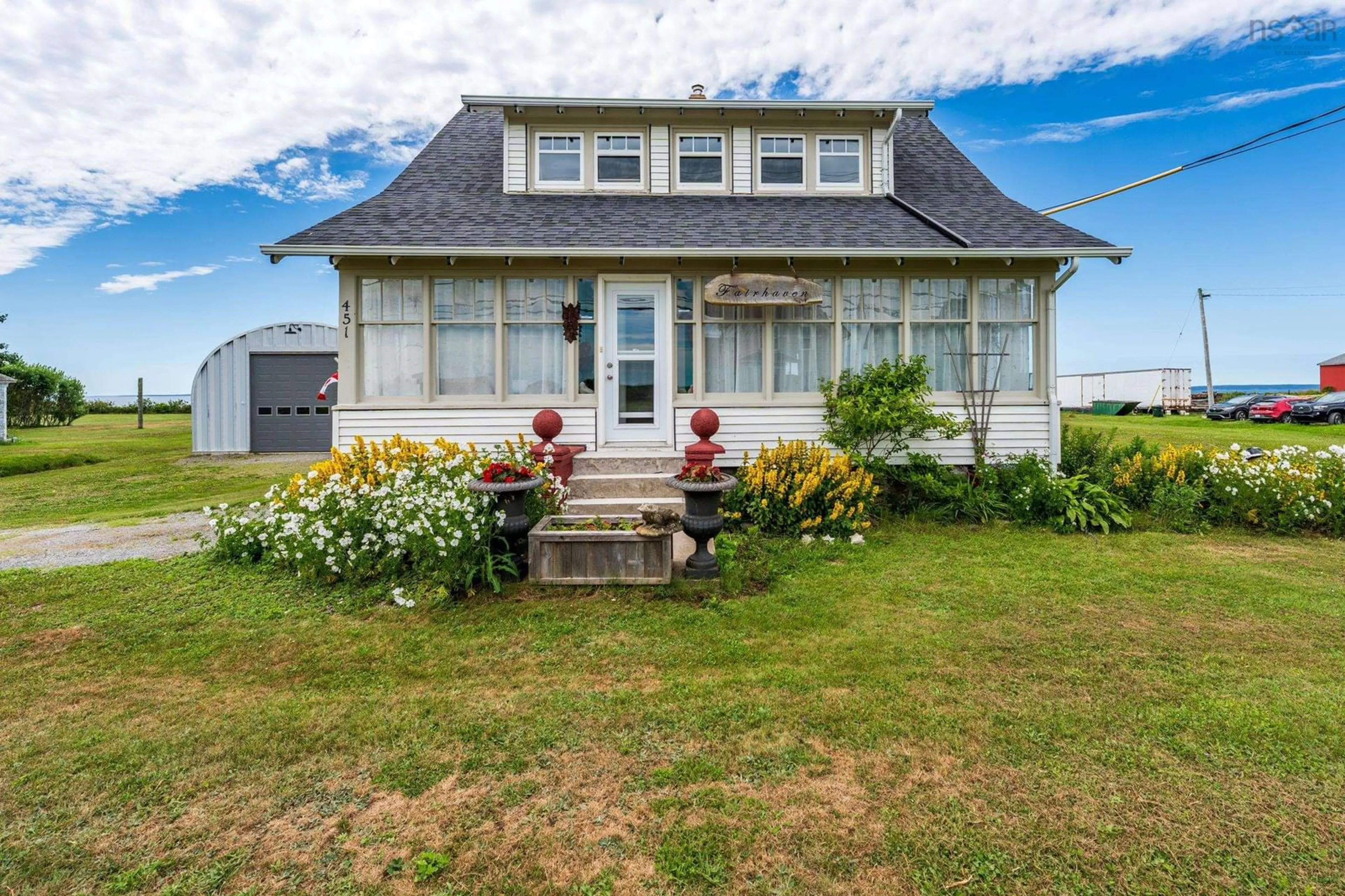 Home with vinyl exterior material, street for 451 Highway 1, Comeauville Nova Scotia B0W 2Z2