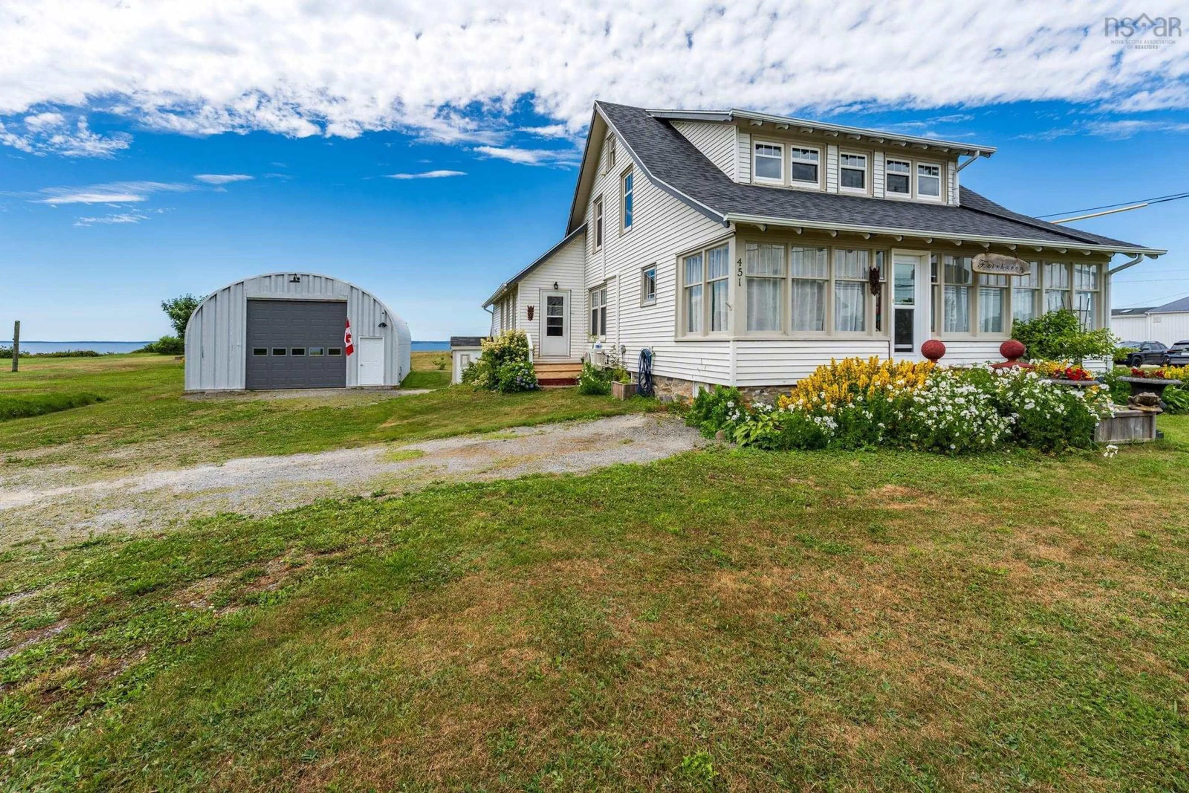 A pic from outside/outdoor area/front of a property/back of a property/a pic from drone, unknown for 451 Highway 1, Comeauville Nova Scotia B0W 2Z2