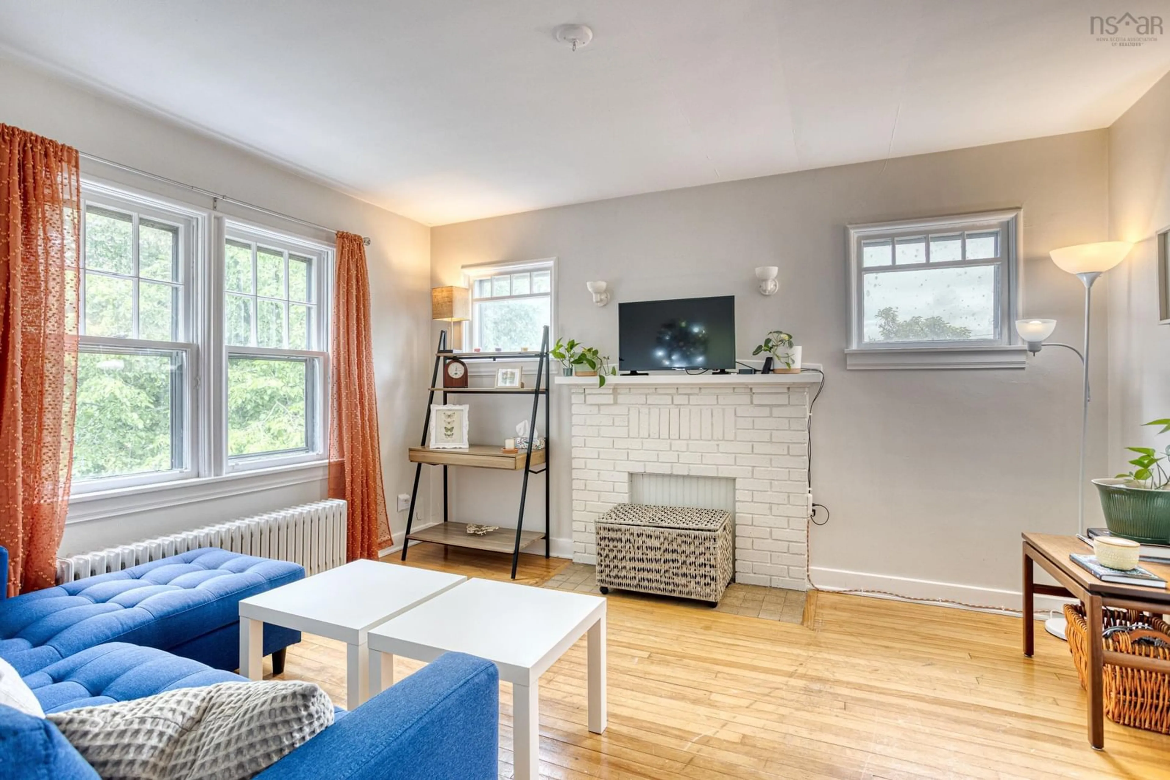 Living room with furniture, wood/laminate floor for 2519.21 Quinn St, Halifax Nova Scotia B3L 3E5