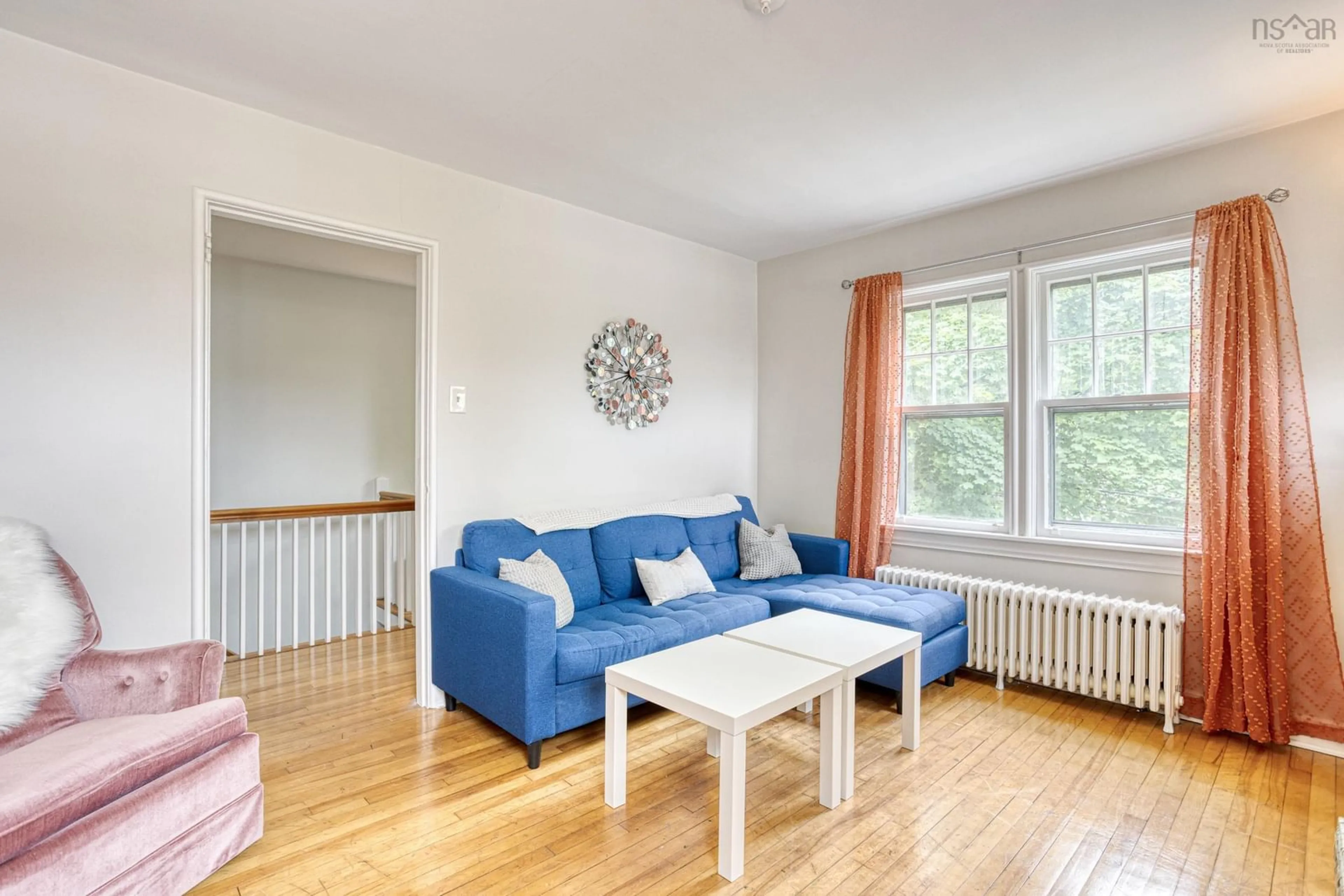 Living room with furniture, wood/laminate floor for 2519.21 Quinn St, Halifax Nova Scotia B3L 3E5