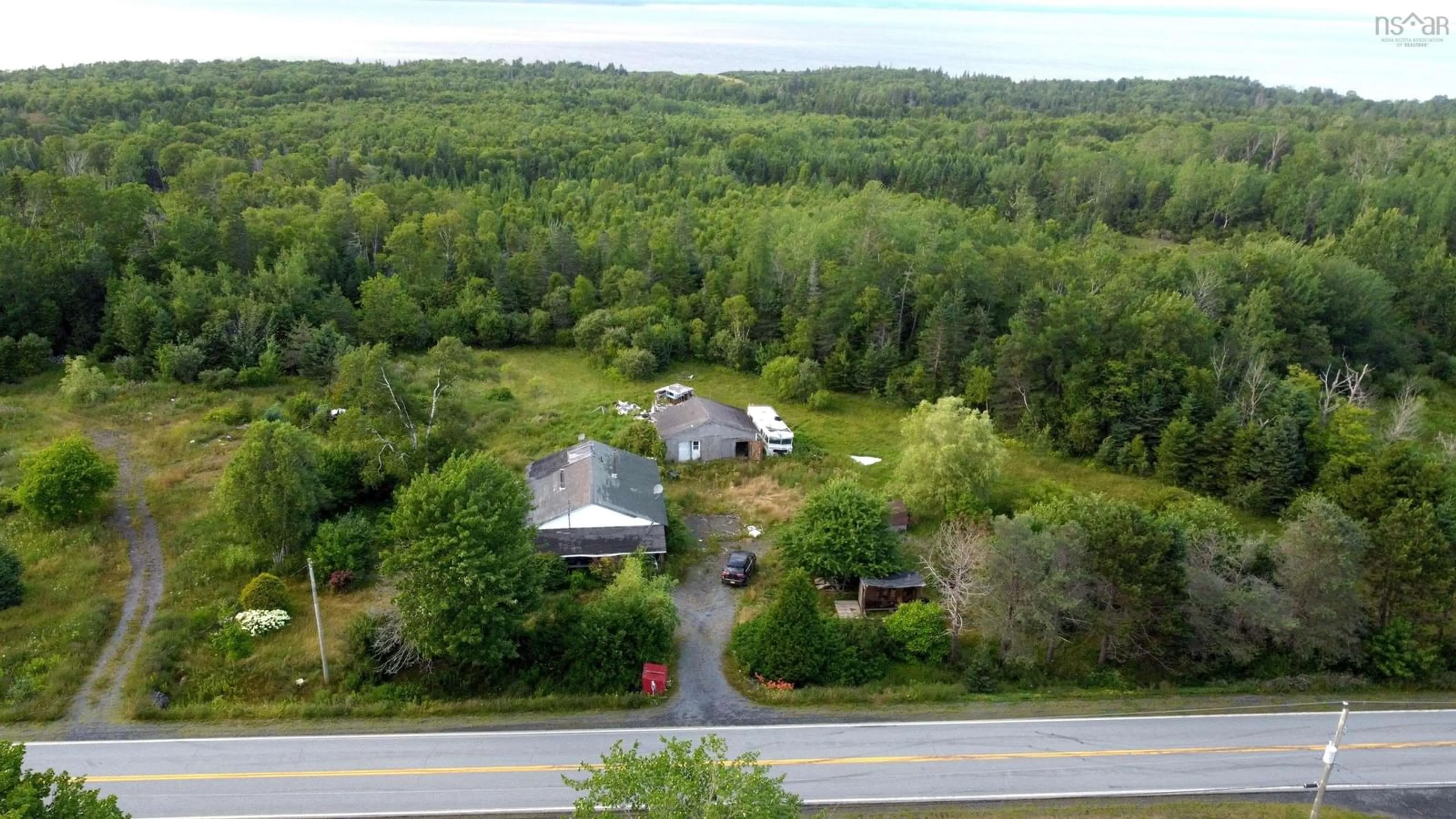 A pic from outside/outdoor area/front of a property/back of a property/a pic from drone, unknown for 2149 Highway 215, Tennecape Nova Scotia B0N 2R0