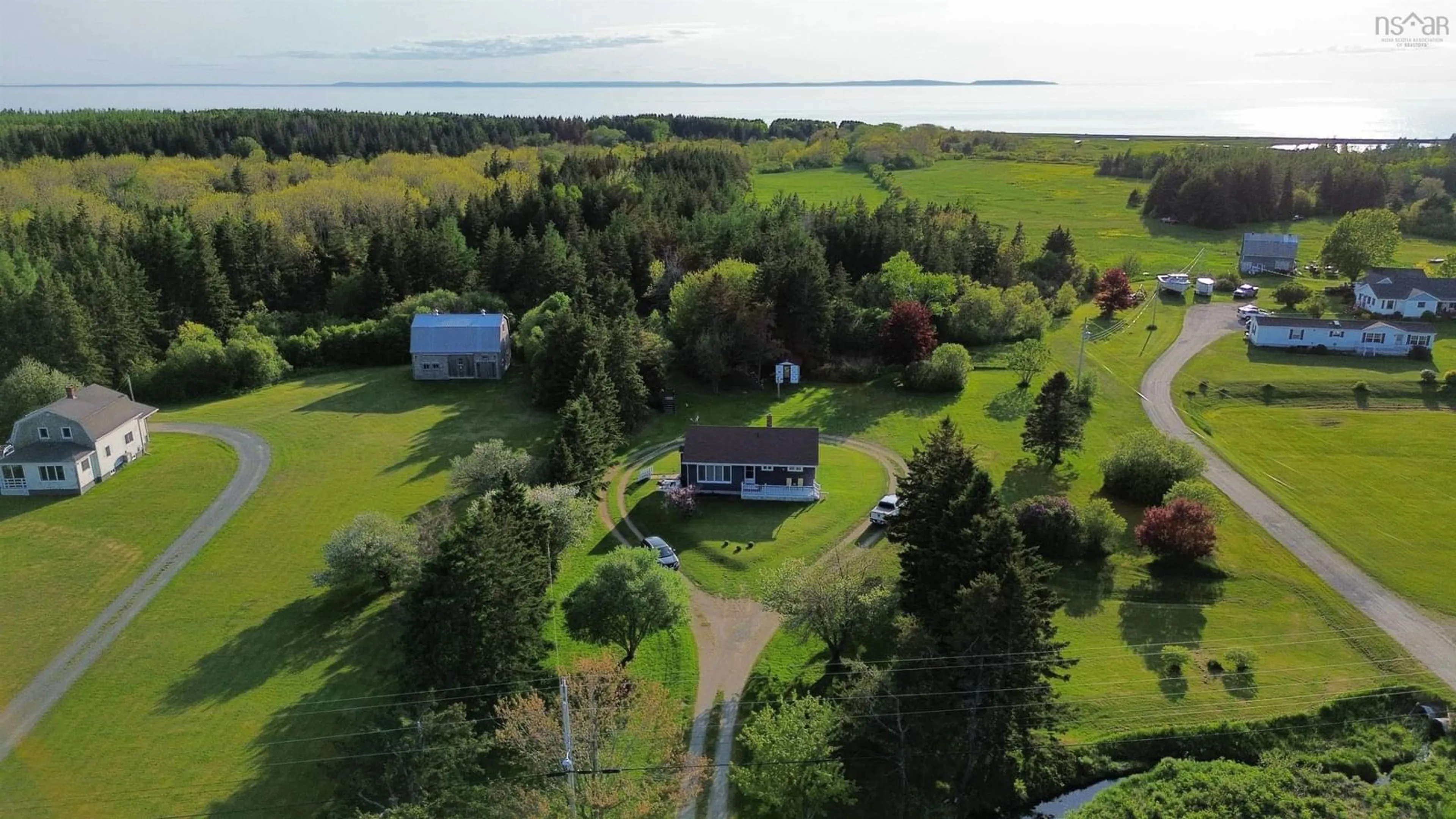 A pic from outside/outdoor area/front of a property/back of a property/a pic from drone, water/lake/river/ocean view for 5147 Highway 19 Hwy, Judique Nova Scotia B0E 1P0