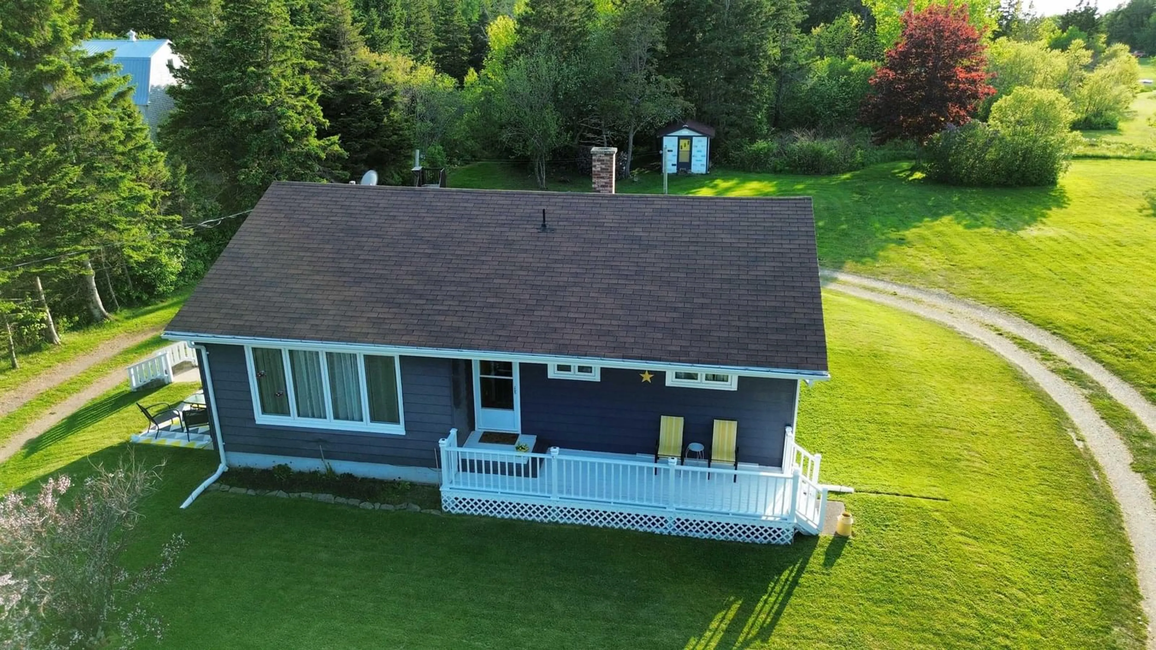 A pic from outside/outdoor area/front of a property/back of a property/a pic from drone, water/lake/river/ocean view for 5147 Highway 19 Hwy, Judique Nova Scotia B0E 1P0