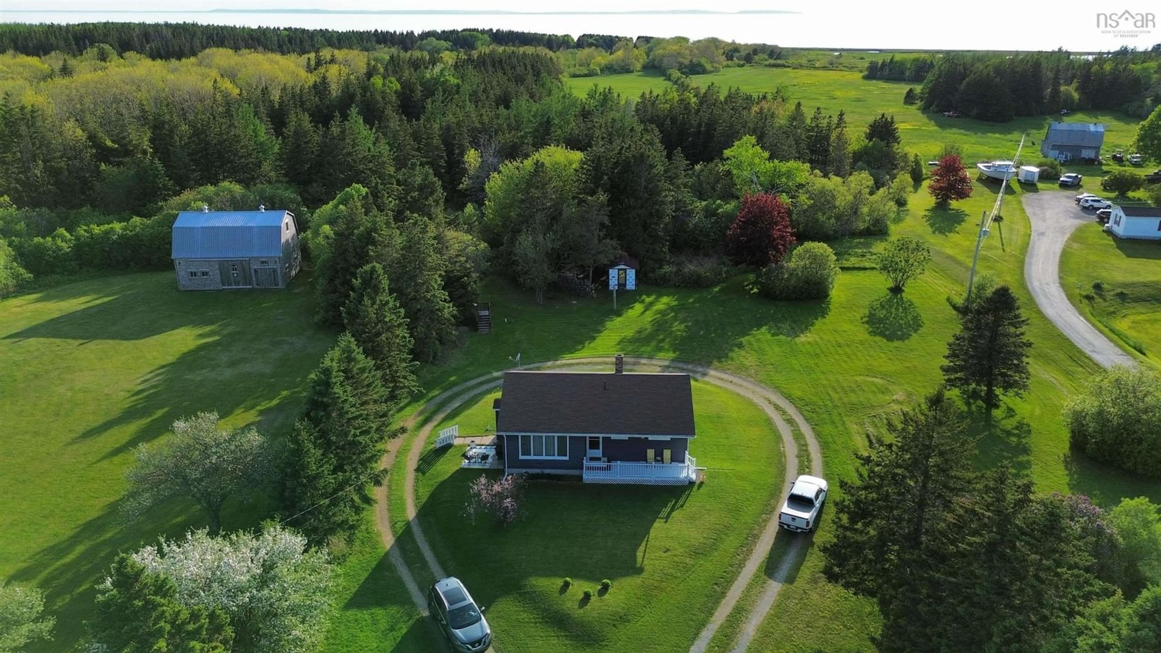 A pic from outside/outdoor area/front of a property/back of a property/a pic from drone, water/lake/river/ocean view for 5147 Highway 19 Hwy, Judique Nova Scotia B0E 1P0