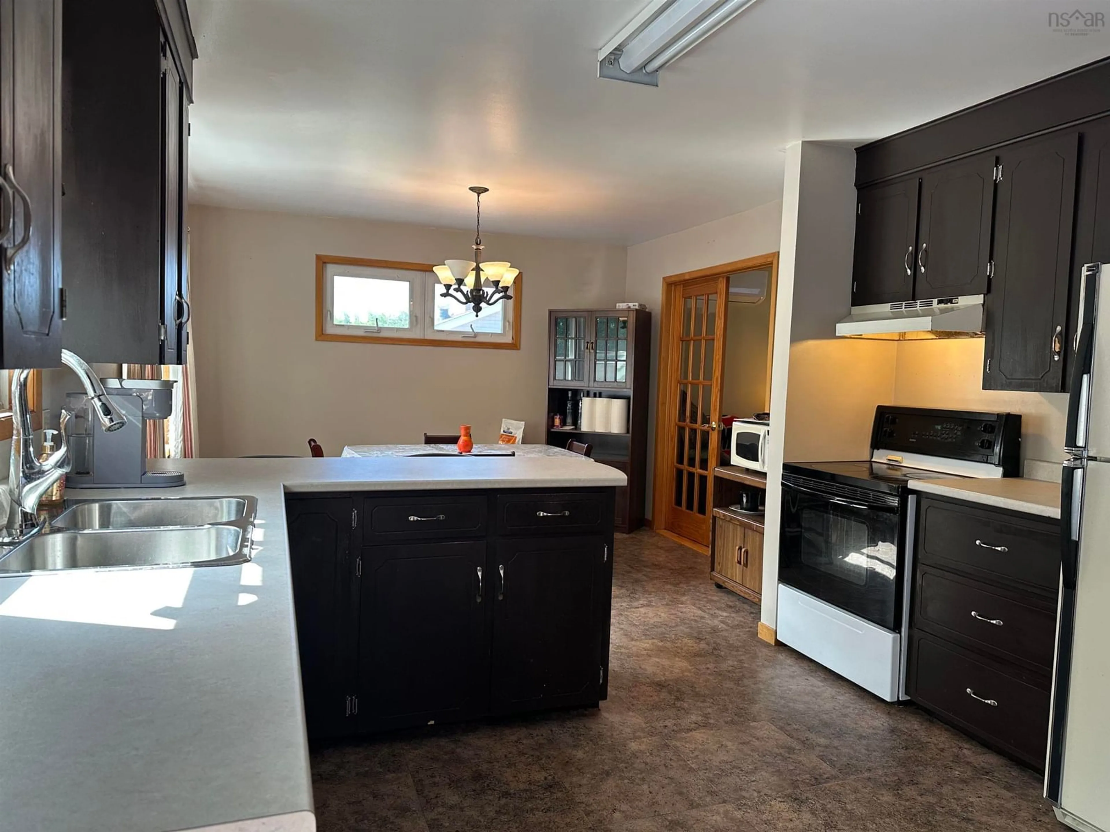 Open concept kitchen, unknown for 208 Spruce Dr, Salmon River Nova Scotia B2H 6G2