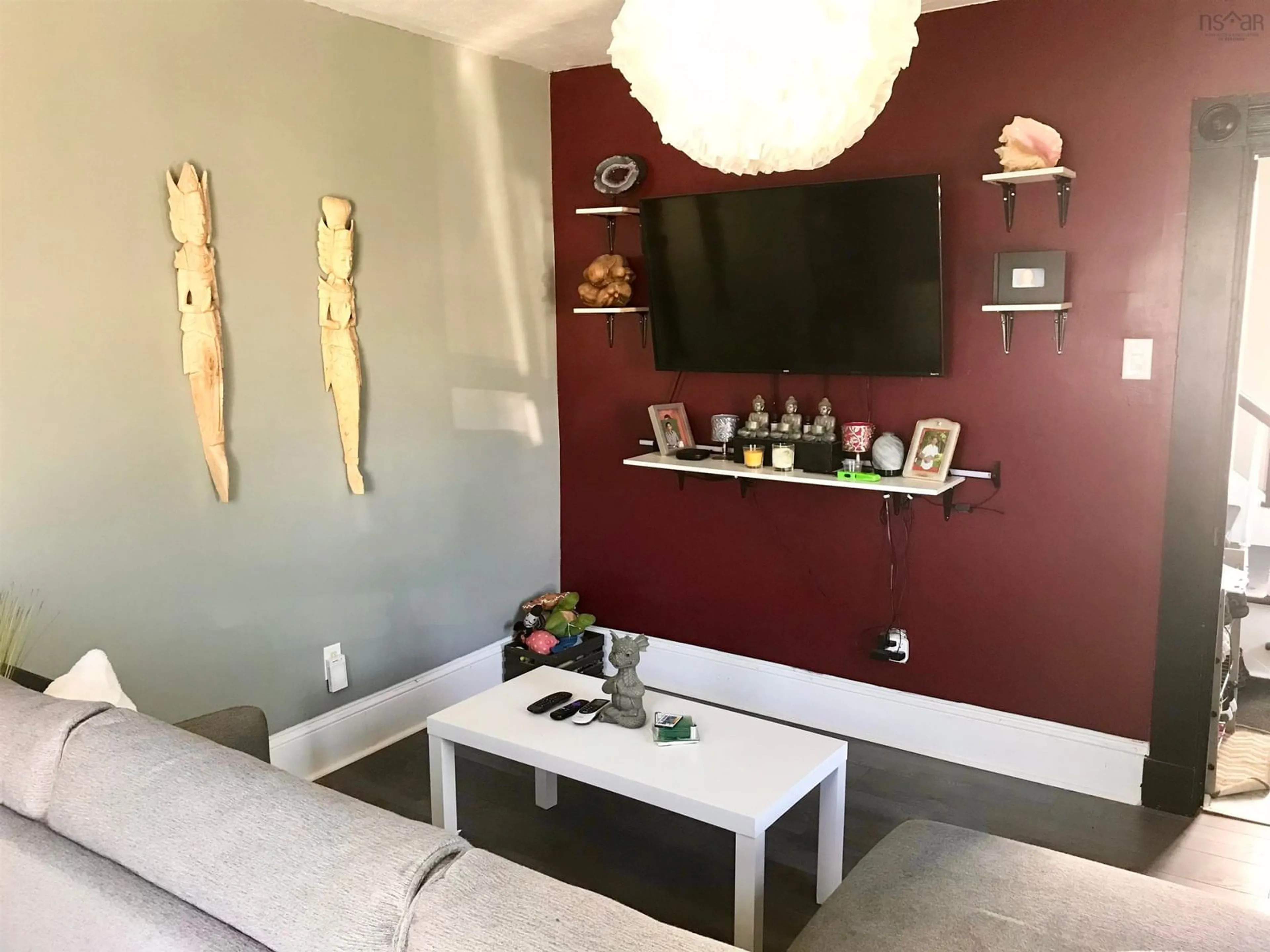 Living room with furniture, unknown for 31 Barnard St, Yarmouth Nova Scotia B5A 3T4