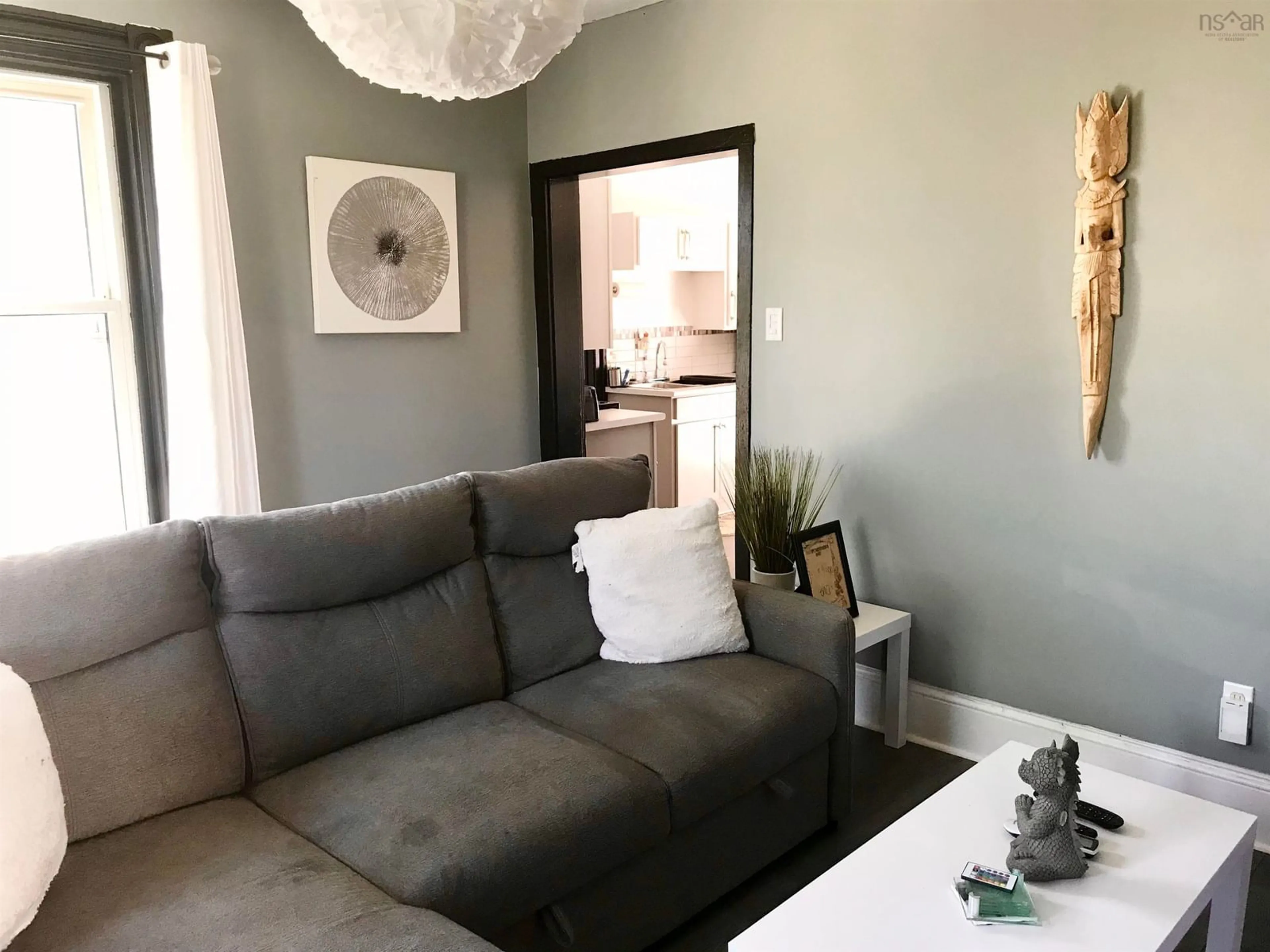 Living room with furniture, unknown for 31 Barnard St, Yarmouth Nova Scotia B5A 3T4