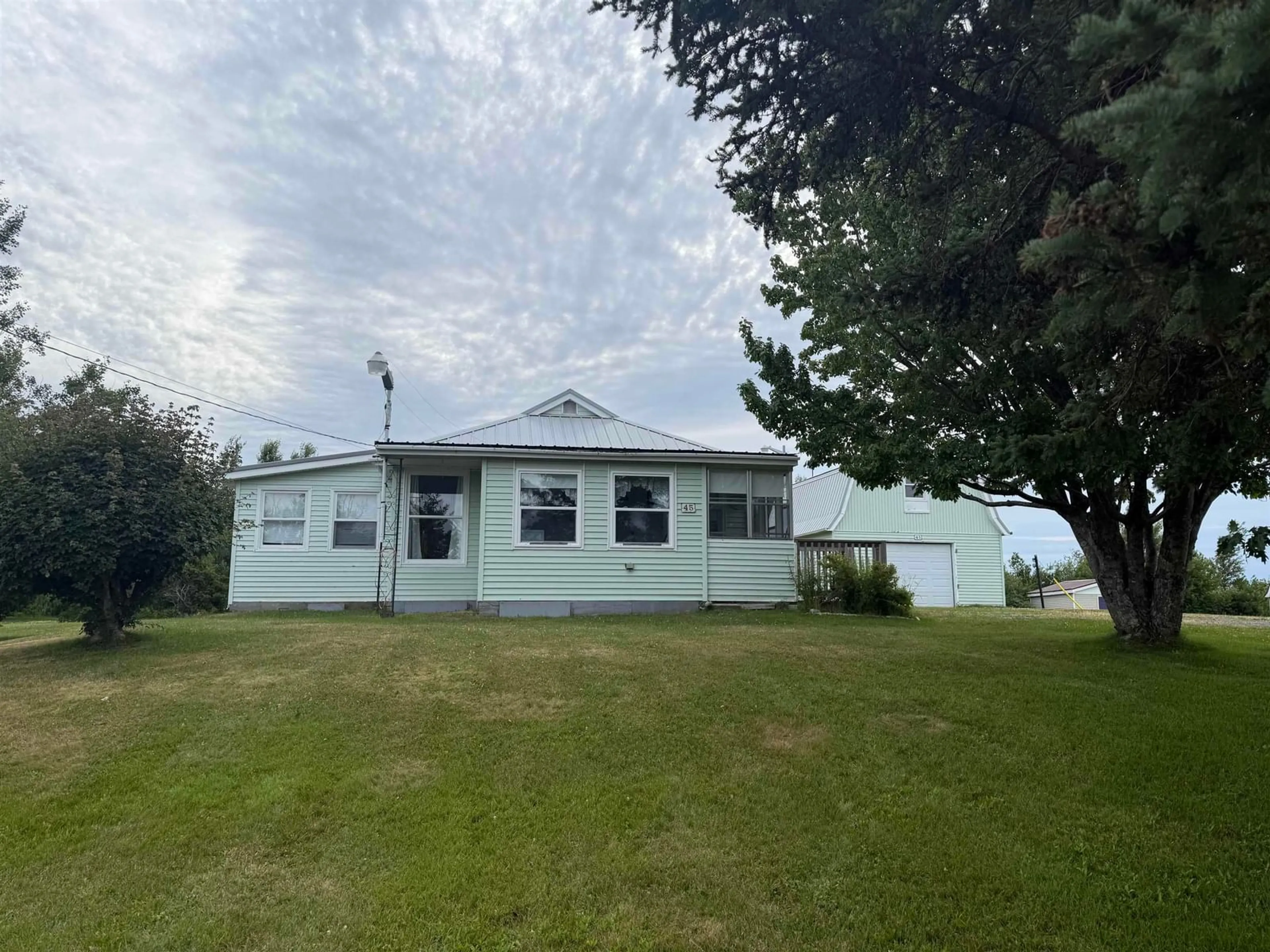 A pic from outside/outdoor area/front of a property/back of a property/a pic from drone, water/lake/river/ocean view for 45 Murdocks Lane, Ponds Nova Scotia B0K 1G0