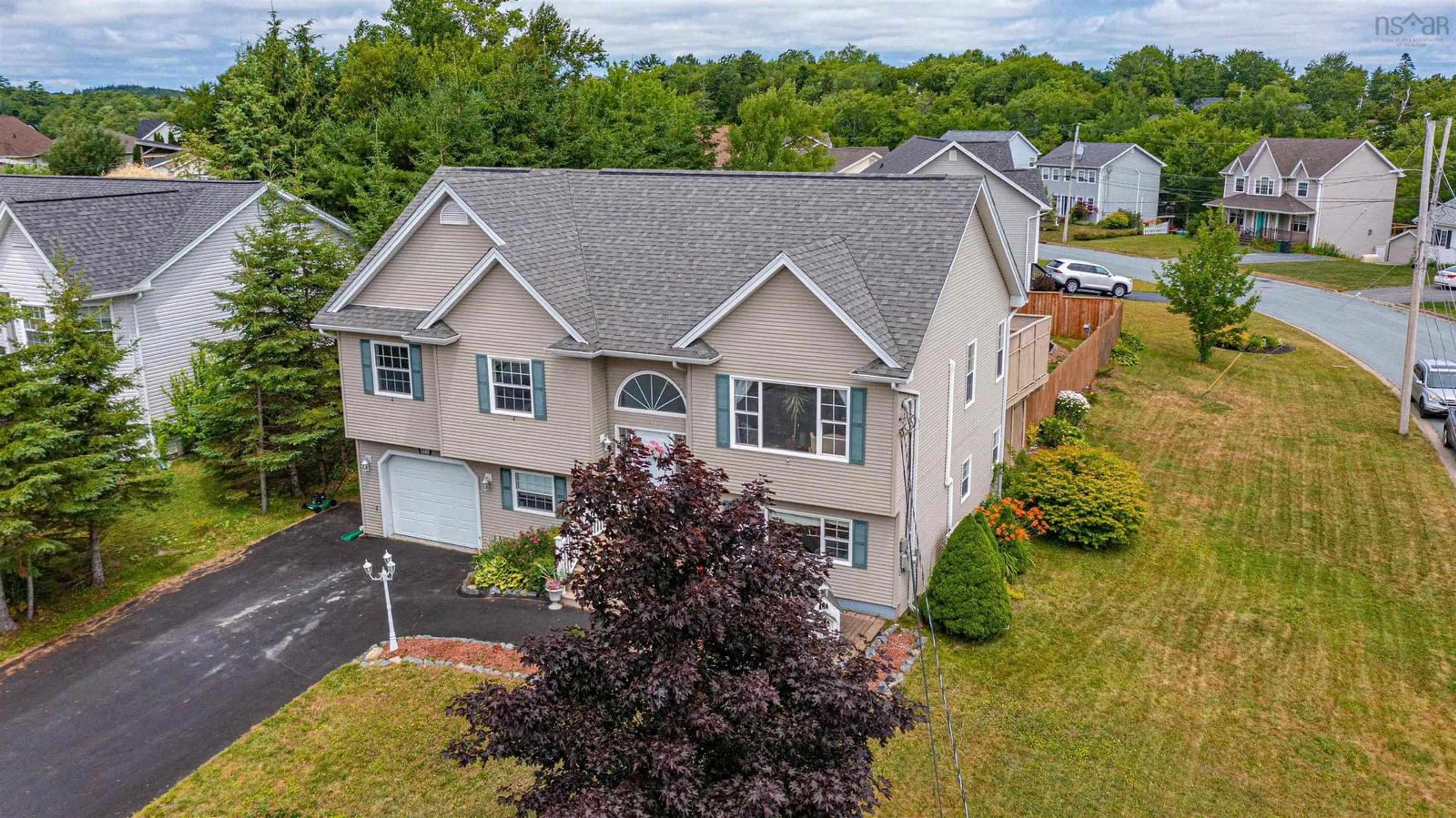 A pic from outside/outdoor area/front of a property/back of a property/a pic from drone, street for 455 Springfield Lake Rd, Middle Sackville Nova Scotia B4E 3K3