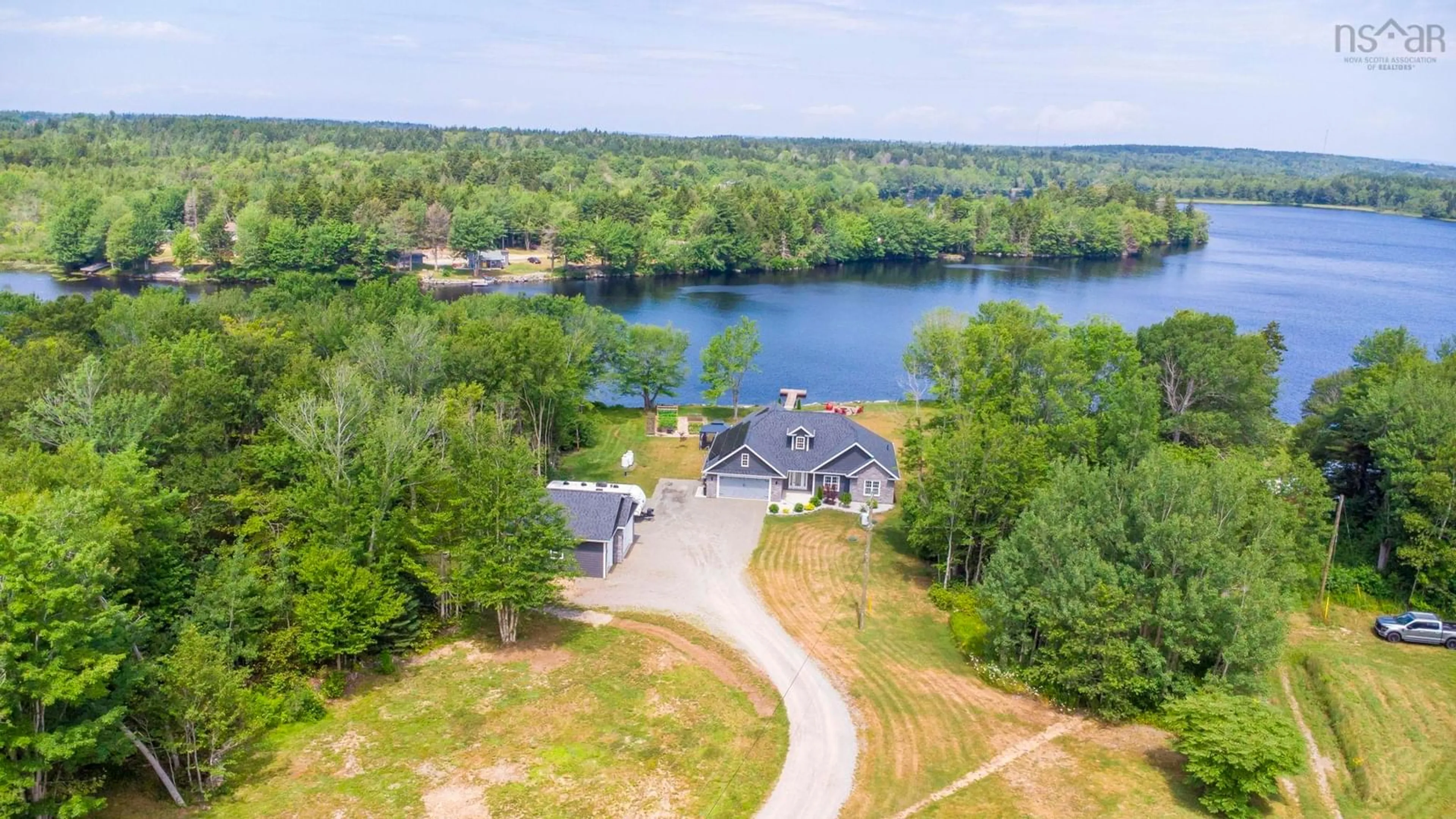 A pic from outside/outdoor area/front of a property/back of a property/a pic from drone, water/lake/river/ocean view for 405 Townshipline Rd, Ohio Nova Scotia B0W 3T0