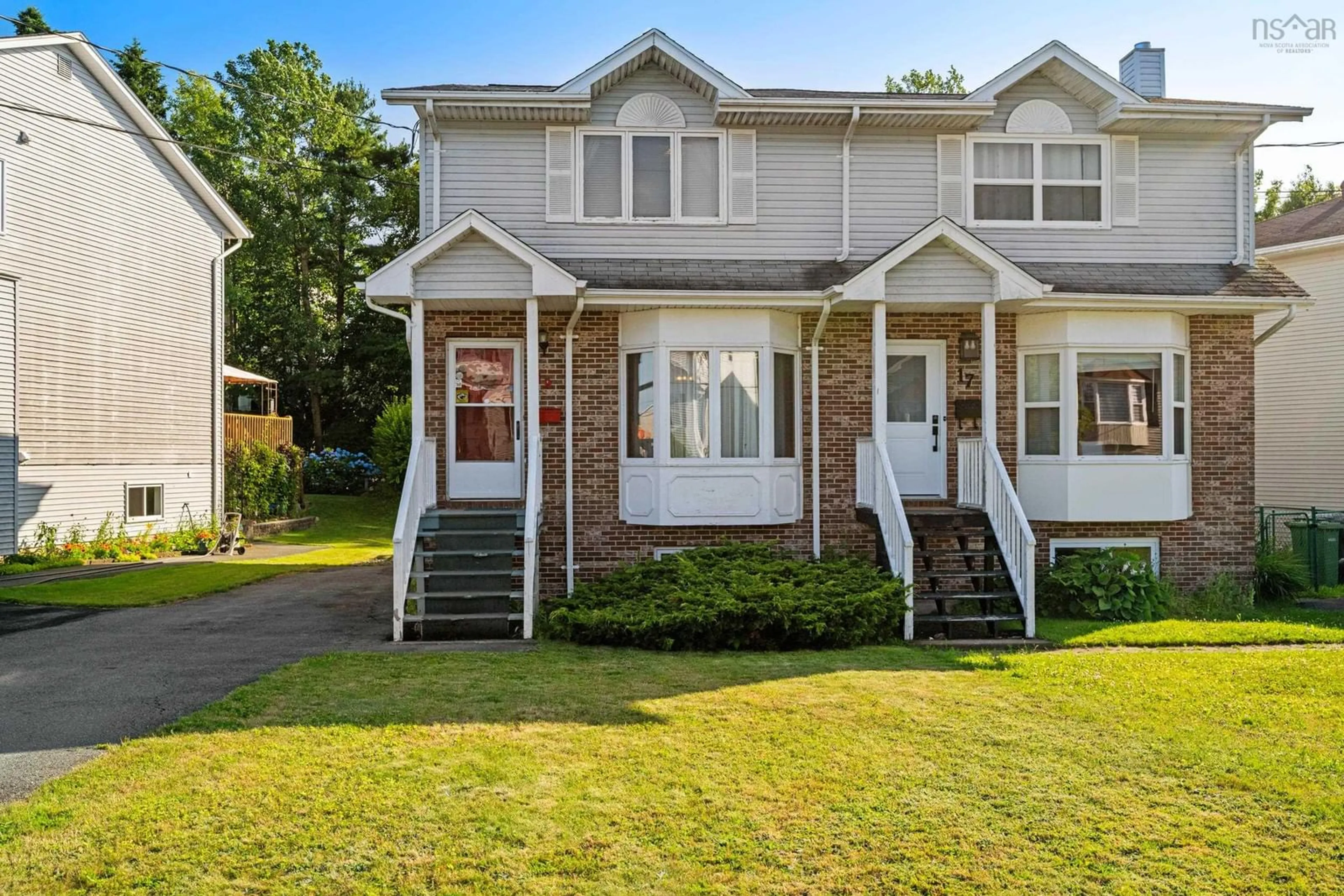Home with vinyl exterior material, street for 19 Herbert Rd, Halifax Nova Scotia B3N 3C7