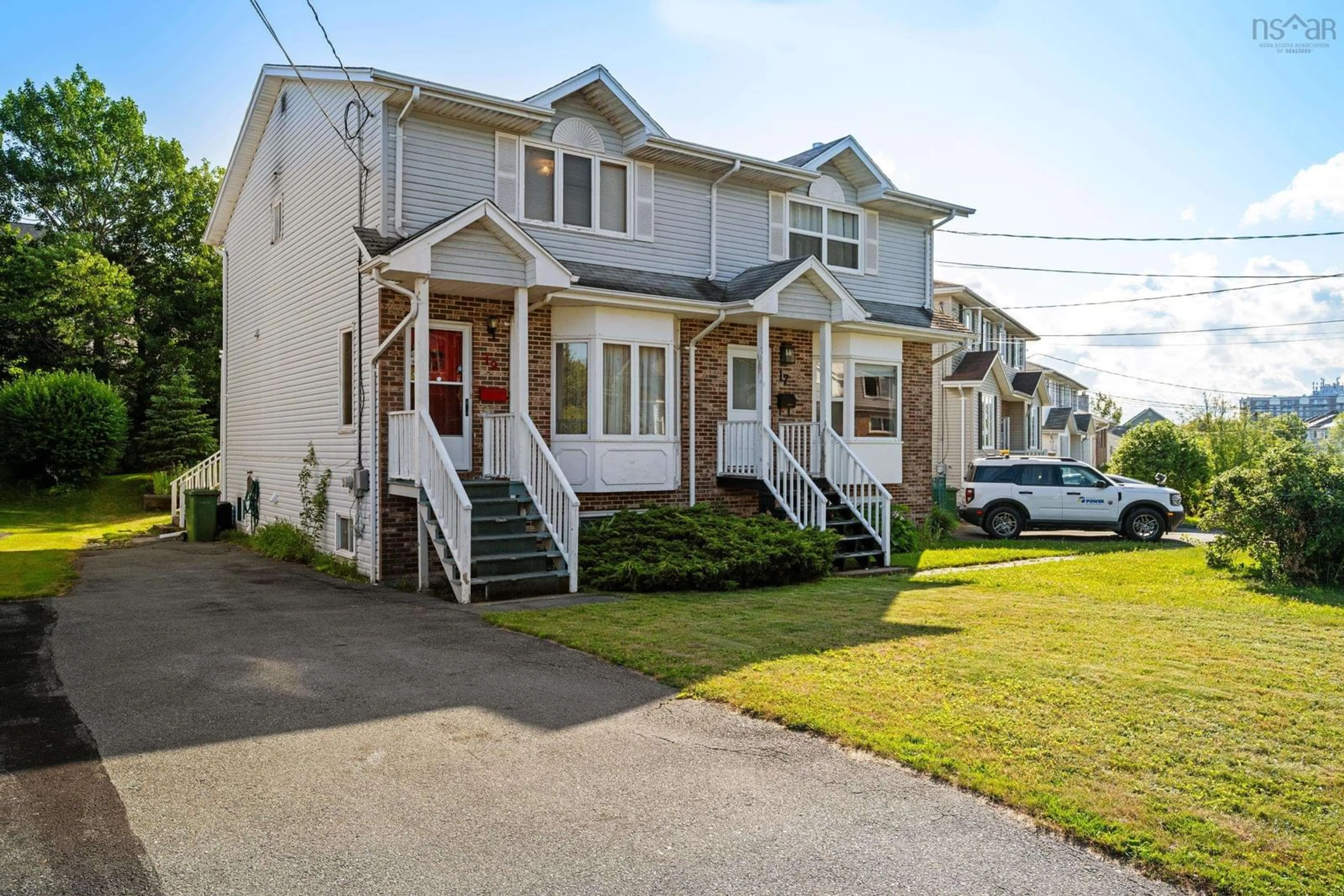 Home with vinyl exterior material, street for 19 Herbert Rd, Halifax Nova Scotia B3N 3C7