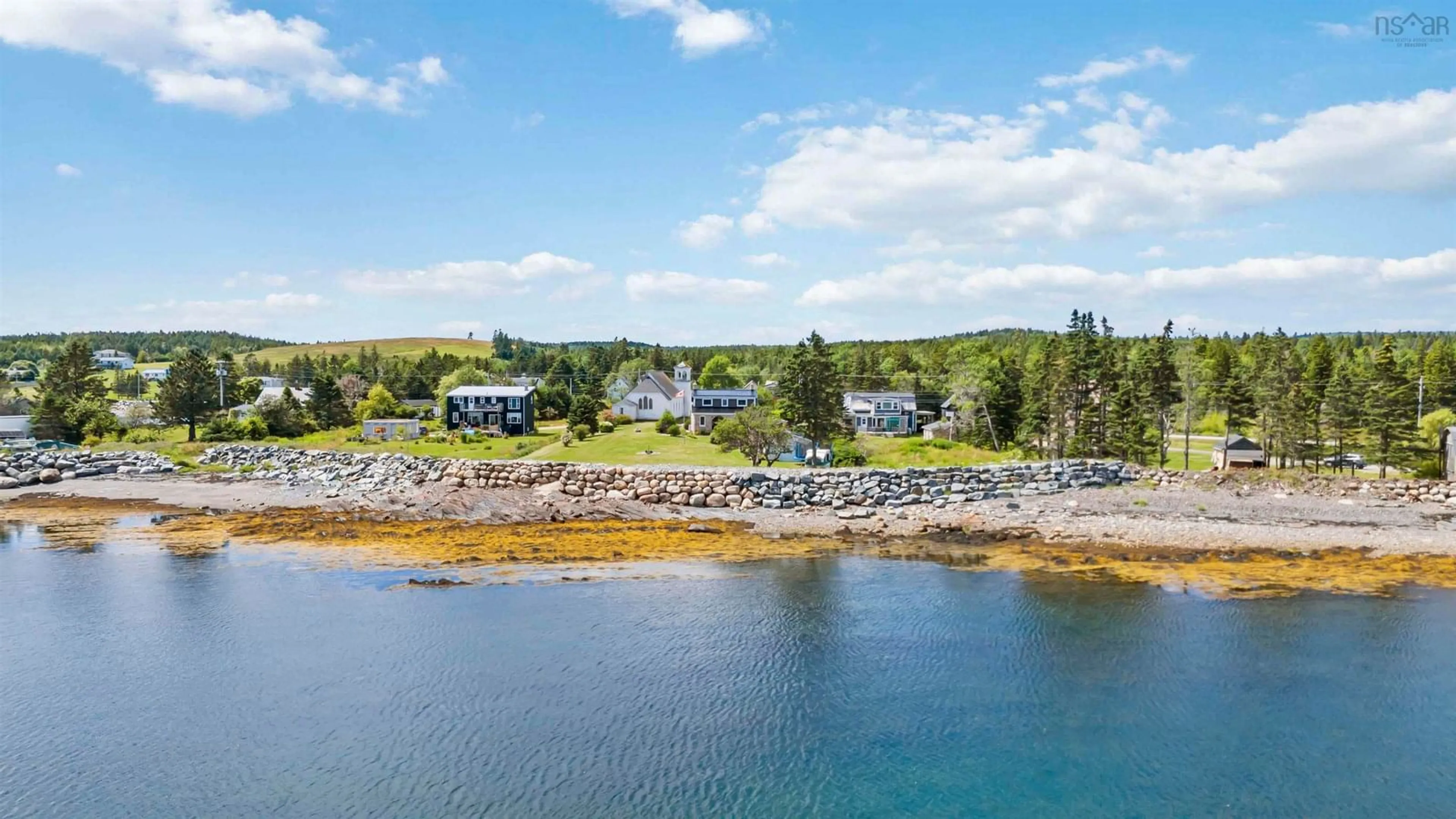 A pic from outside/outdoor area/front of a property/back of a property/a pic from drone, water/lake/river/ocean view for 4027 331 Hwy, Dublin Shore Nova Scotia B0R 1C0