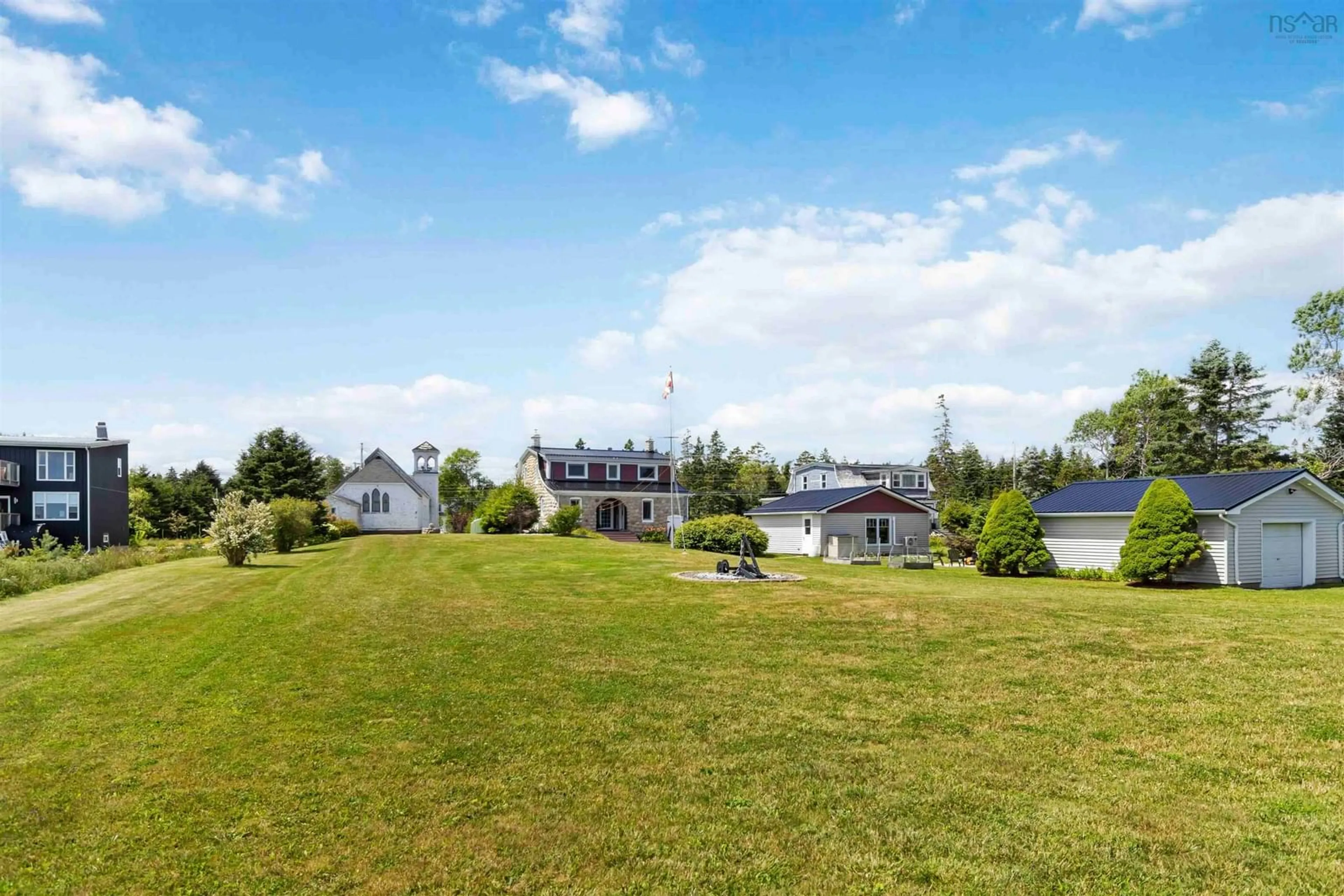 A pic from outside/outdoor area/front of a property/back of a property/a pic from drone, water/lake/river/ocean view for 4027 331 Hwy, Dublin Shore Nova Scotia B0R 1C0