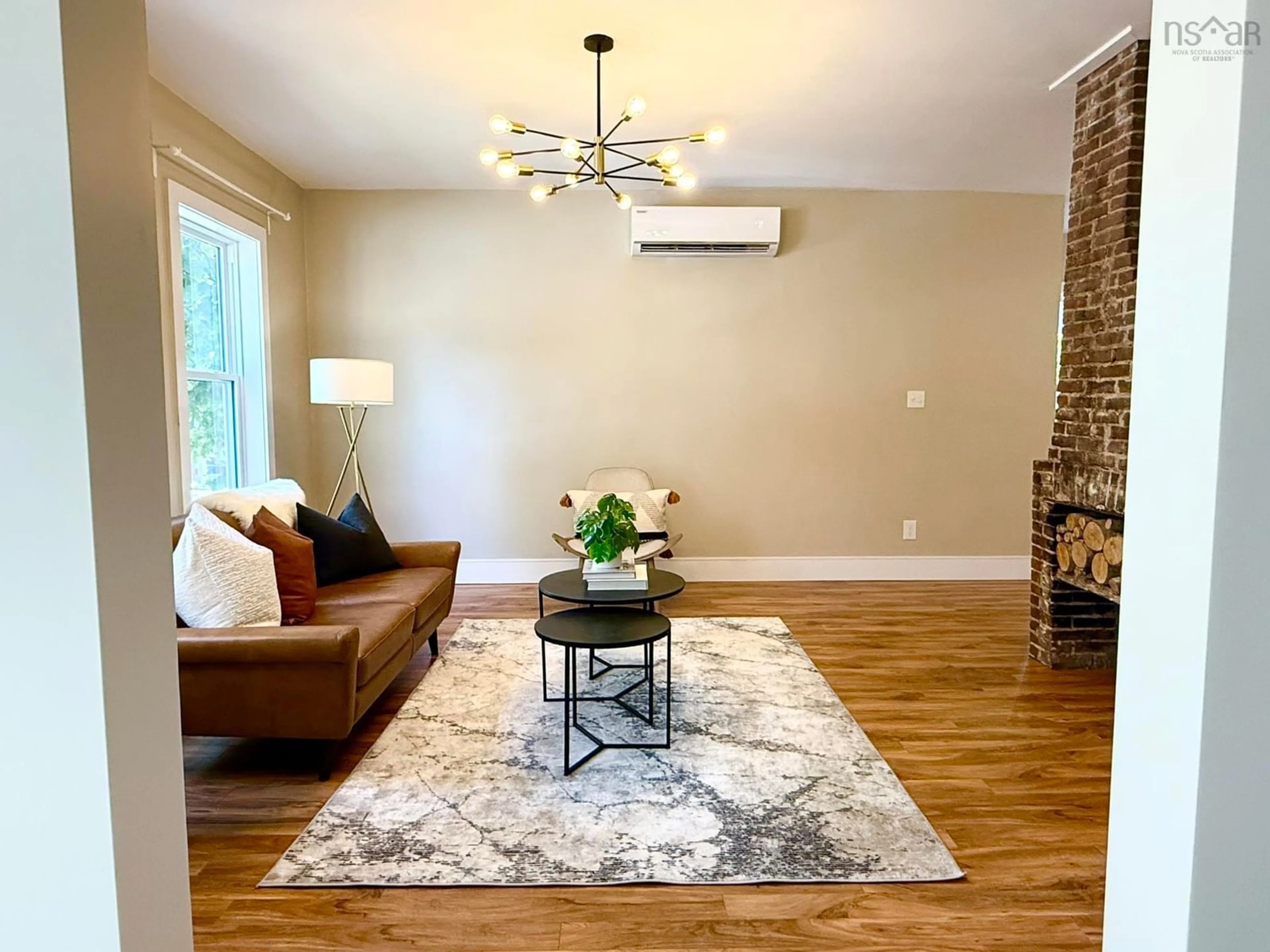 Living room with furniture, wood/laminate floor for 249 Portland St, Dartmouth Nova Scotia B2Y 1J8
