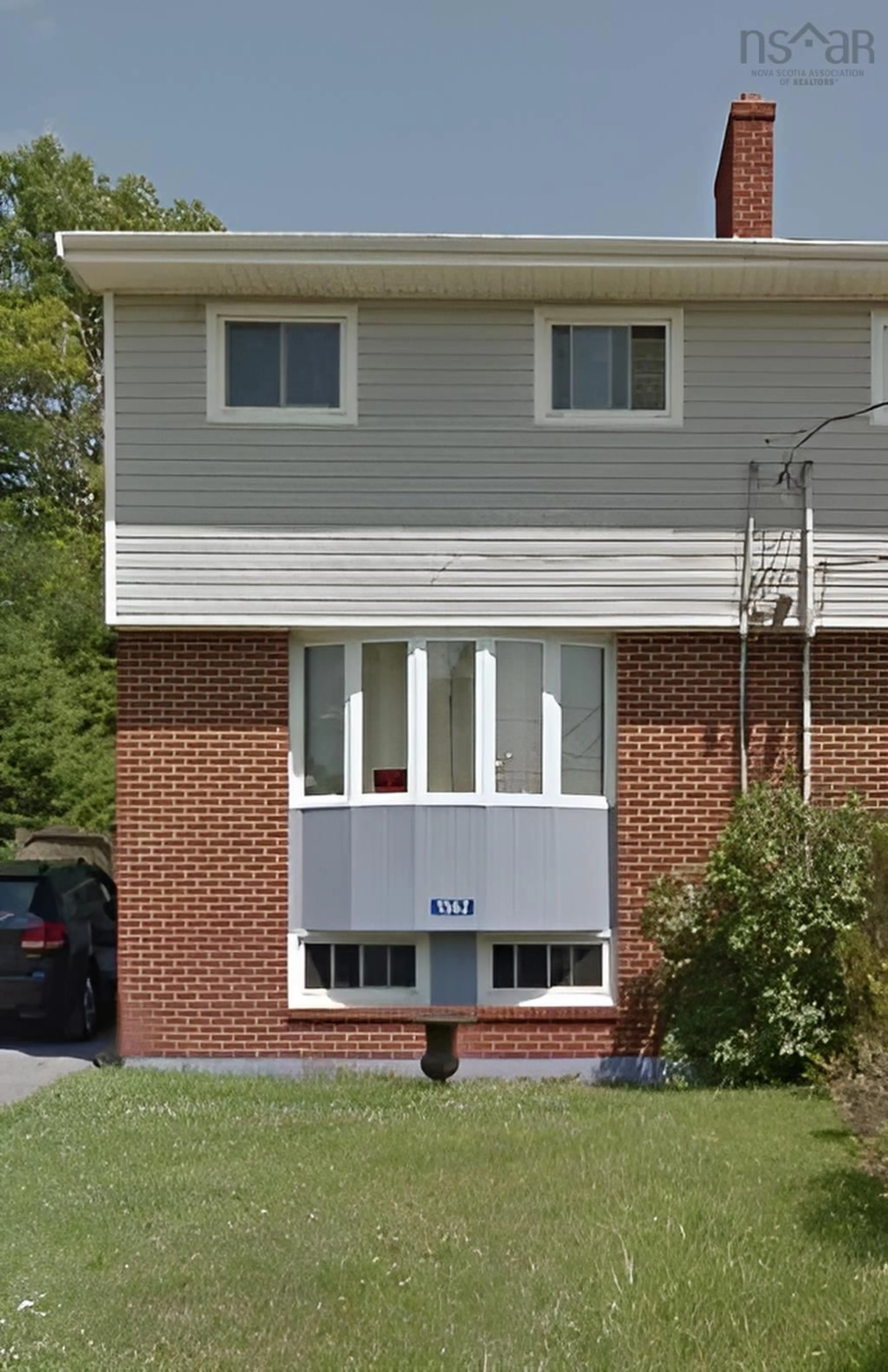Home with vinyl exterior material, street for 1562 Riverside Dr, Lower Sackville Nova Scotia B4C 2Y7