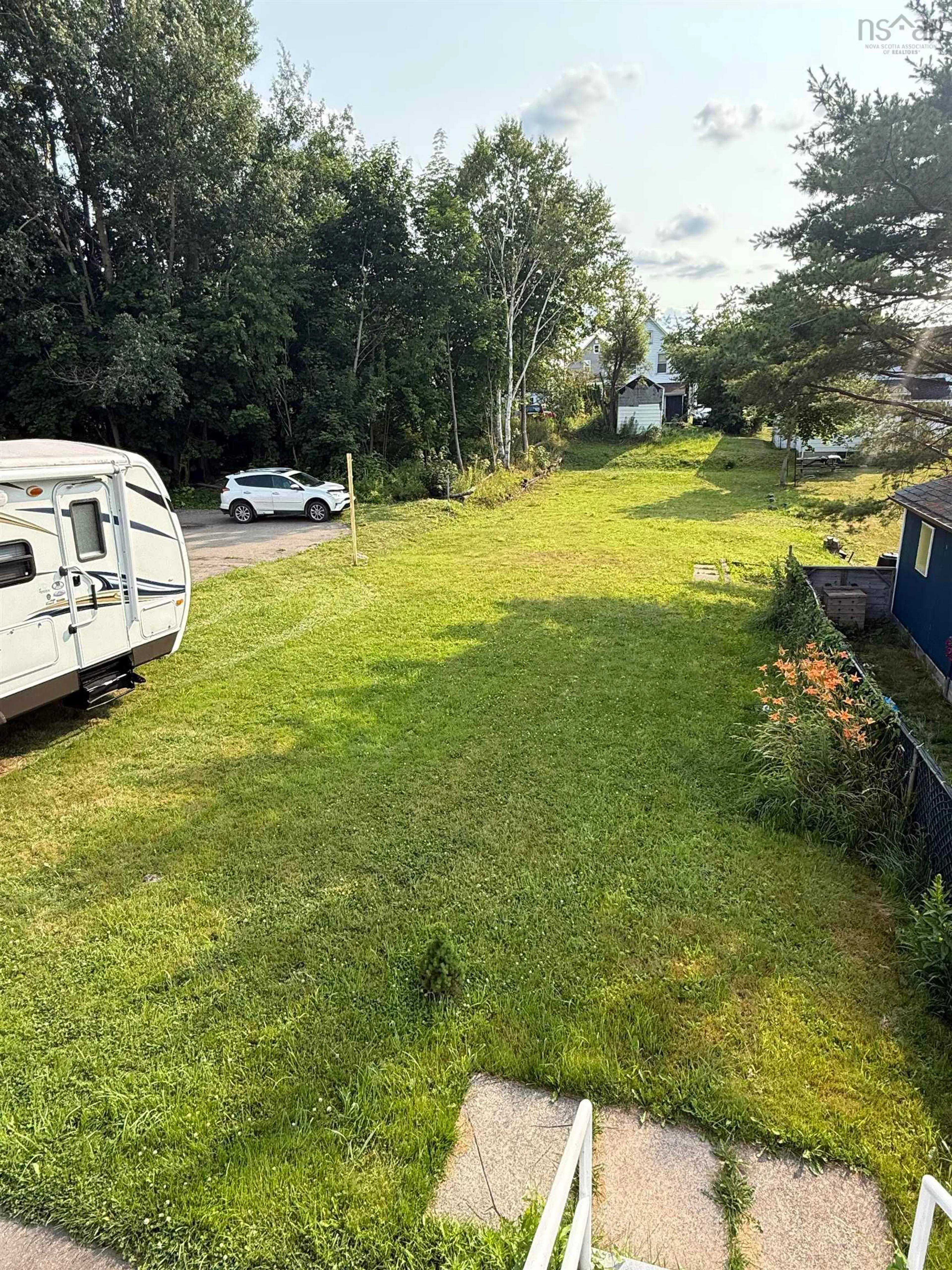 A pic from outside/outdoor area/front of a property/back of a property/a pic from drone, unknown for 30 Harrison Ave, Sydney Nova Scotia B1S 2Y2