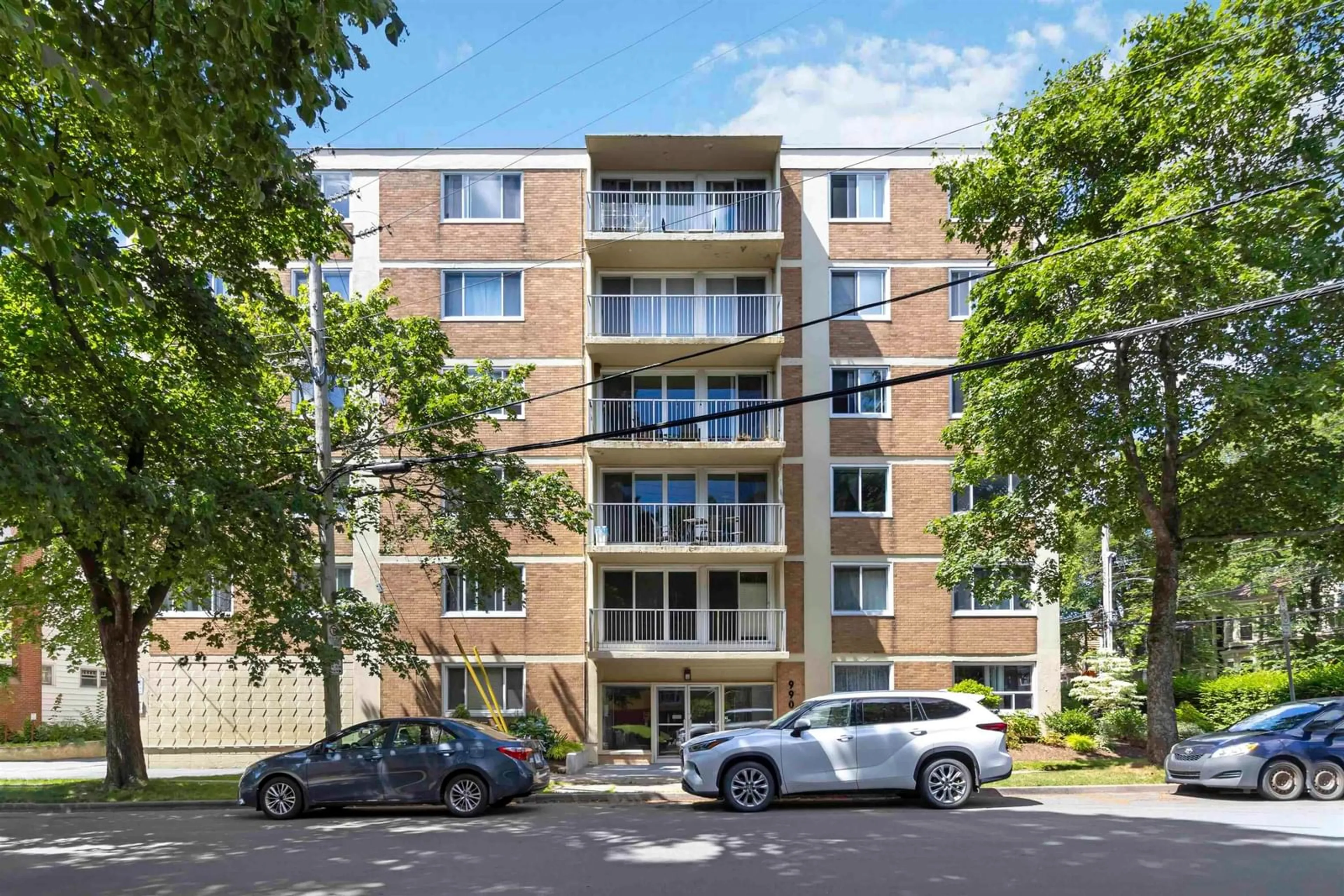 A pic from outside/outdoor area/front of a property/back of a property/a pic from drone, building for 990 Mclean St #304, Halifax Nova Scotia B3H 2V1