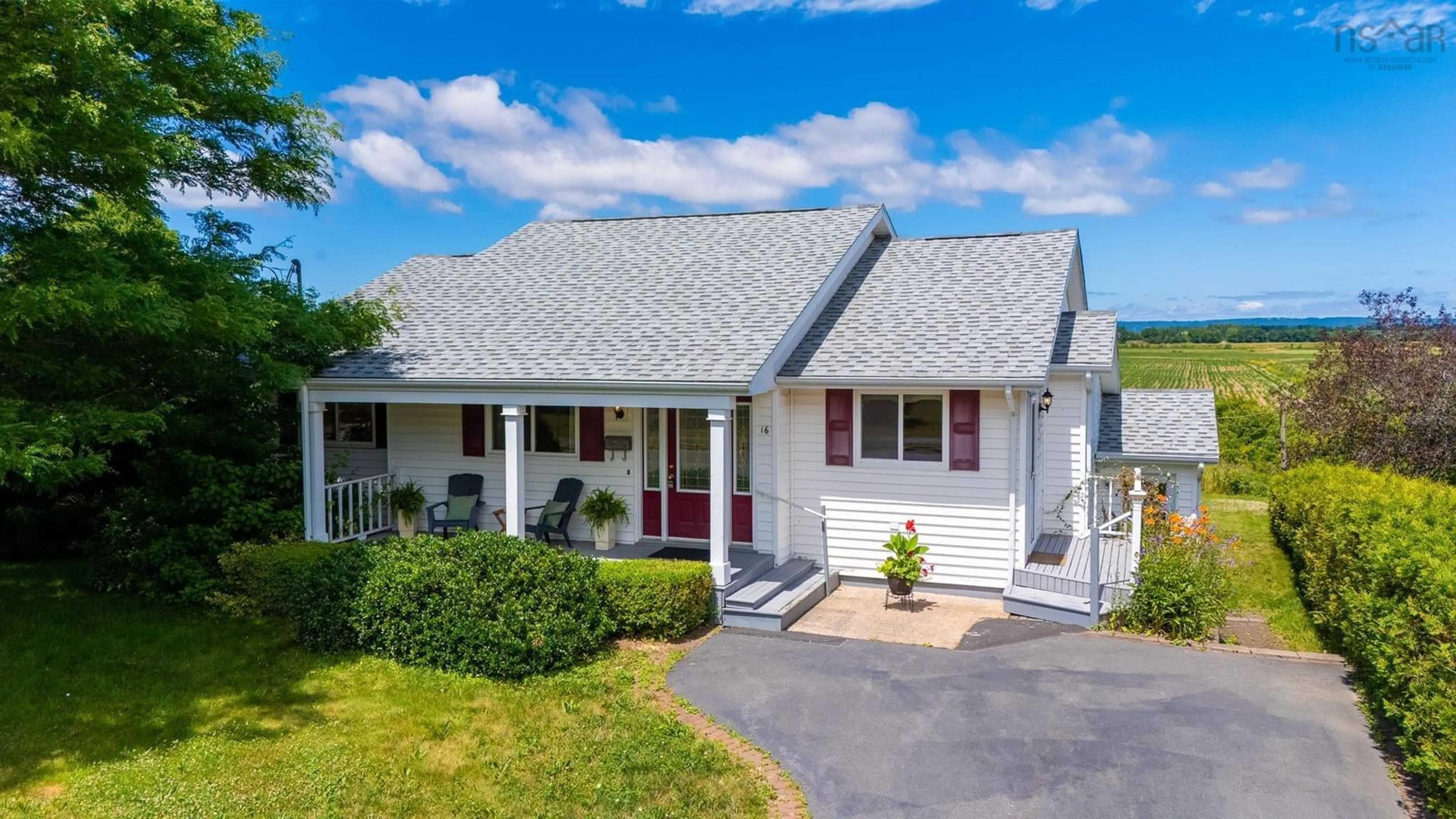 Home with vinyl exterior material, street for 16 Marsh Hawk Dr, Wolfville Nova Scotia B4P 1B2