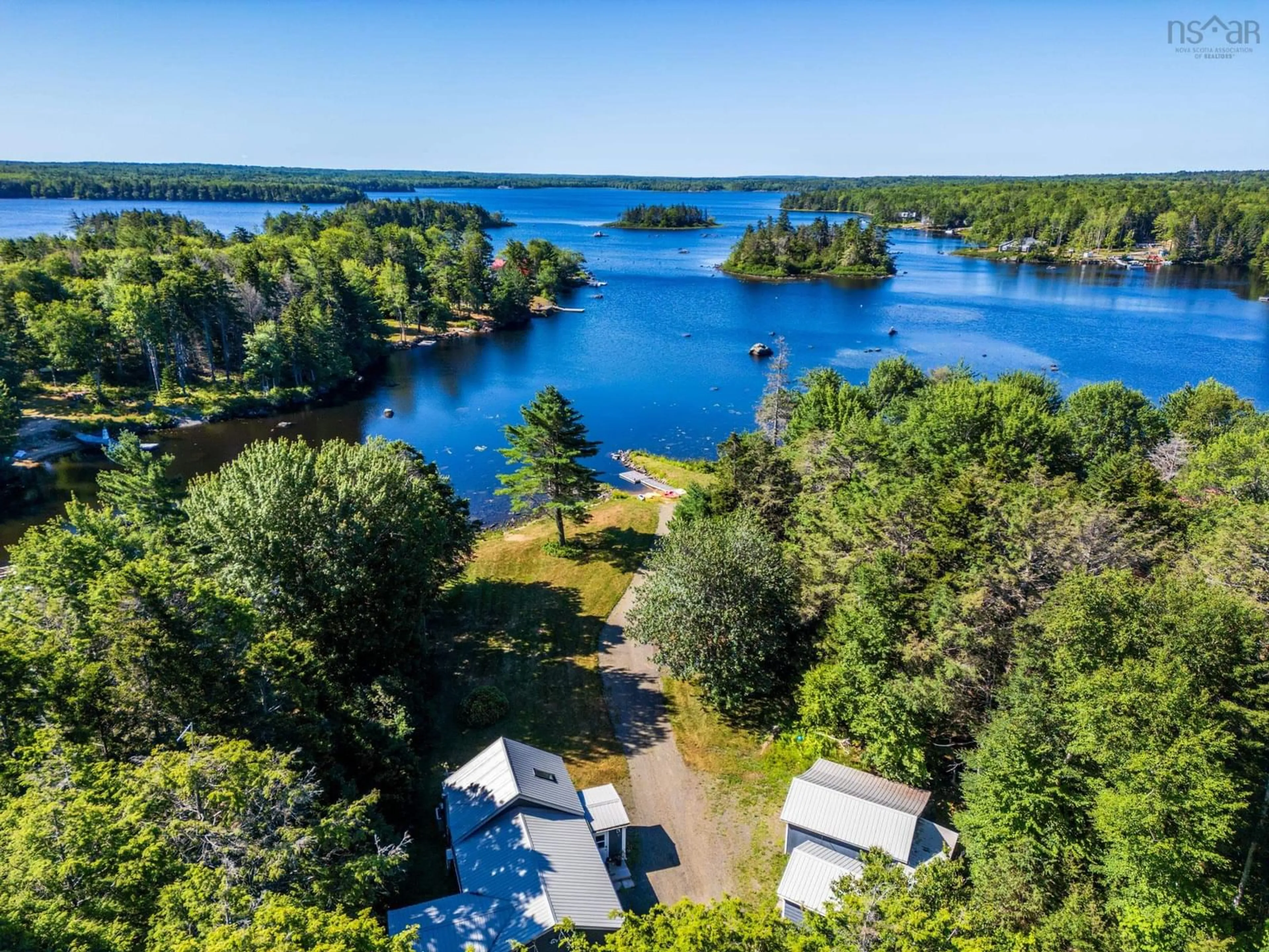 A pic from outside/outdoor area/front of a property/back of a property/a pic from drone, water/lake/river/ocean view for 412 Double Lake Road, North Range Nova Scotia B0W 1H0