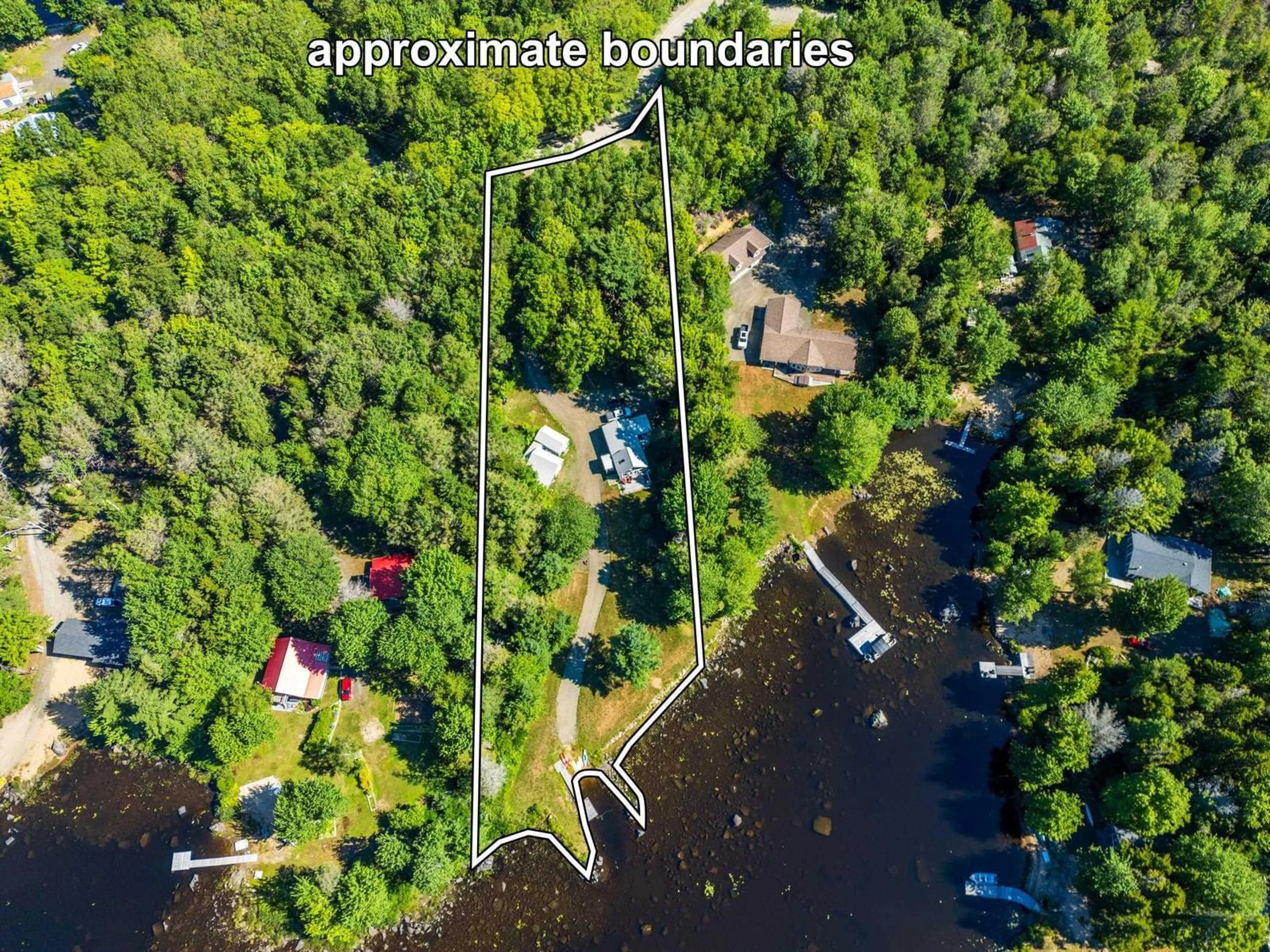 A pic from outside/outdoor area/front of a property/back of a property/a pic from drone, water/lake/river/ocean view for 412 Double Lake Road, North Range Nova Scotia B0W 1H0