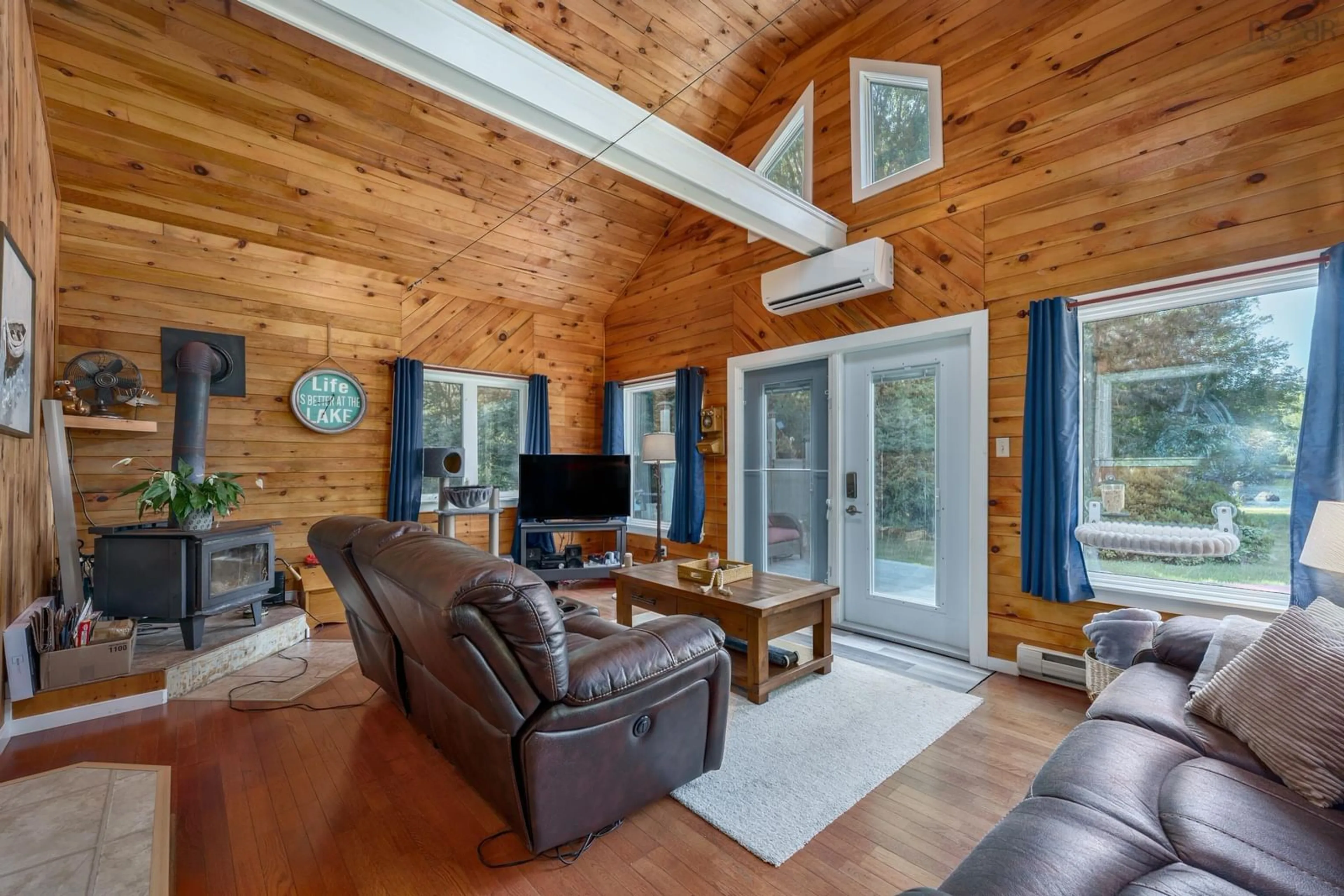 Living room with furniture, wood/laminate floor for 412 Double Lake Road, North Range Nova Scotia B0W 1H0