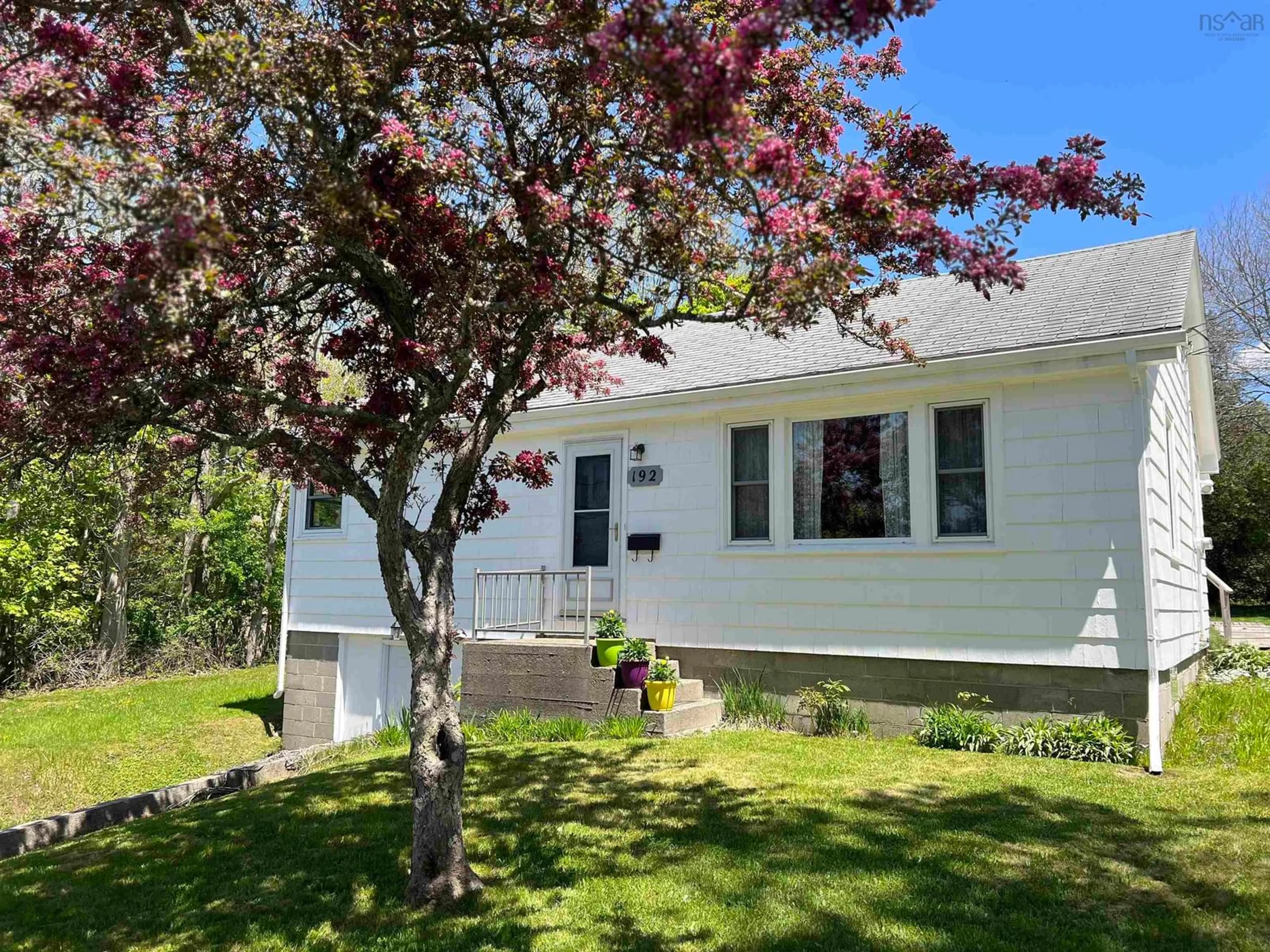 Home with vinyl exterior material, street for 192 Harriet St, Shelburne Nova Scotia B0T 1W0